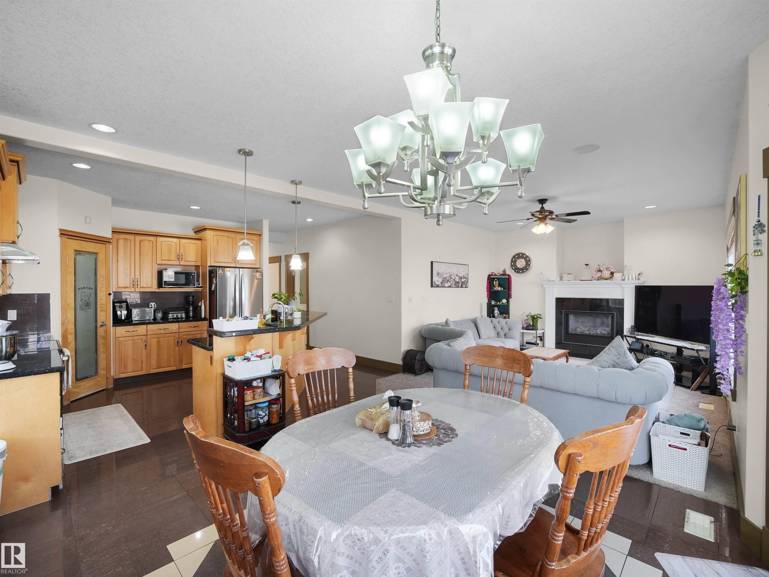 1015 61 Street, Edmonton, AB - Indoor Photo Showing Dining Room With Fireplace