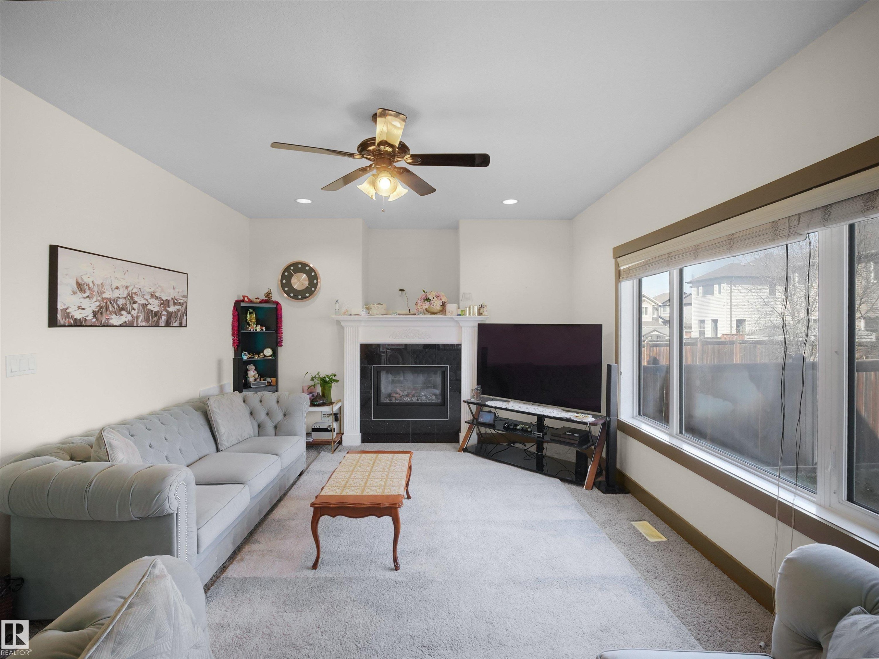 1015 61 Street, Edmonton, AB - Indoor Photo Showing Living Room With Fireplace