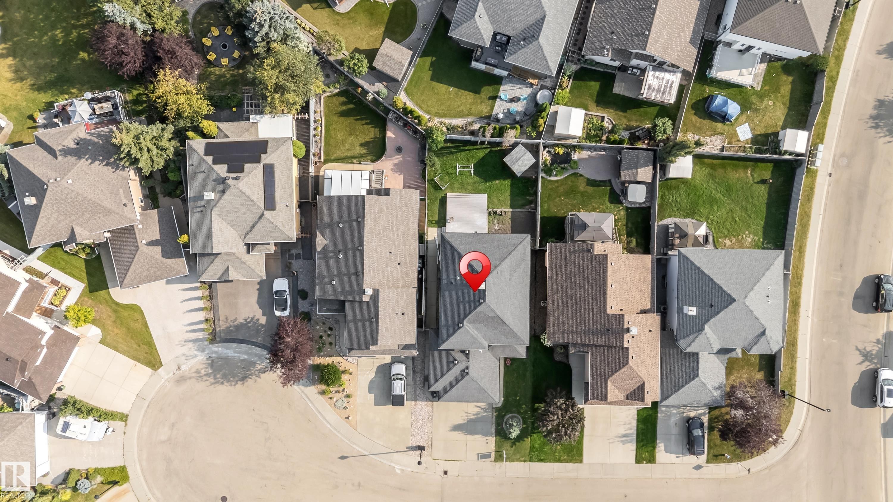 Residential property with a multi-gabled roof and a paved driveway - 10621 175A Avenue, Edmonton, AB