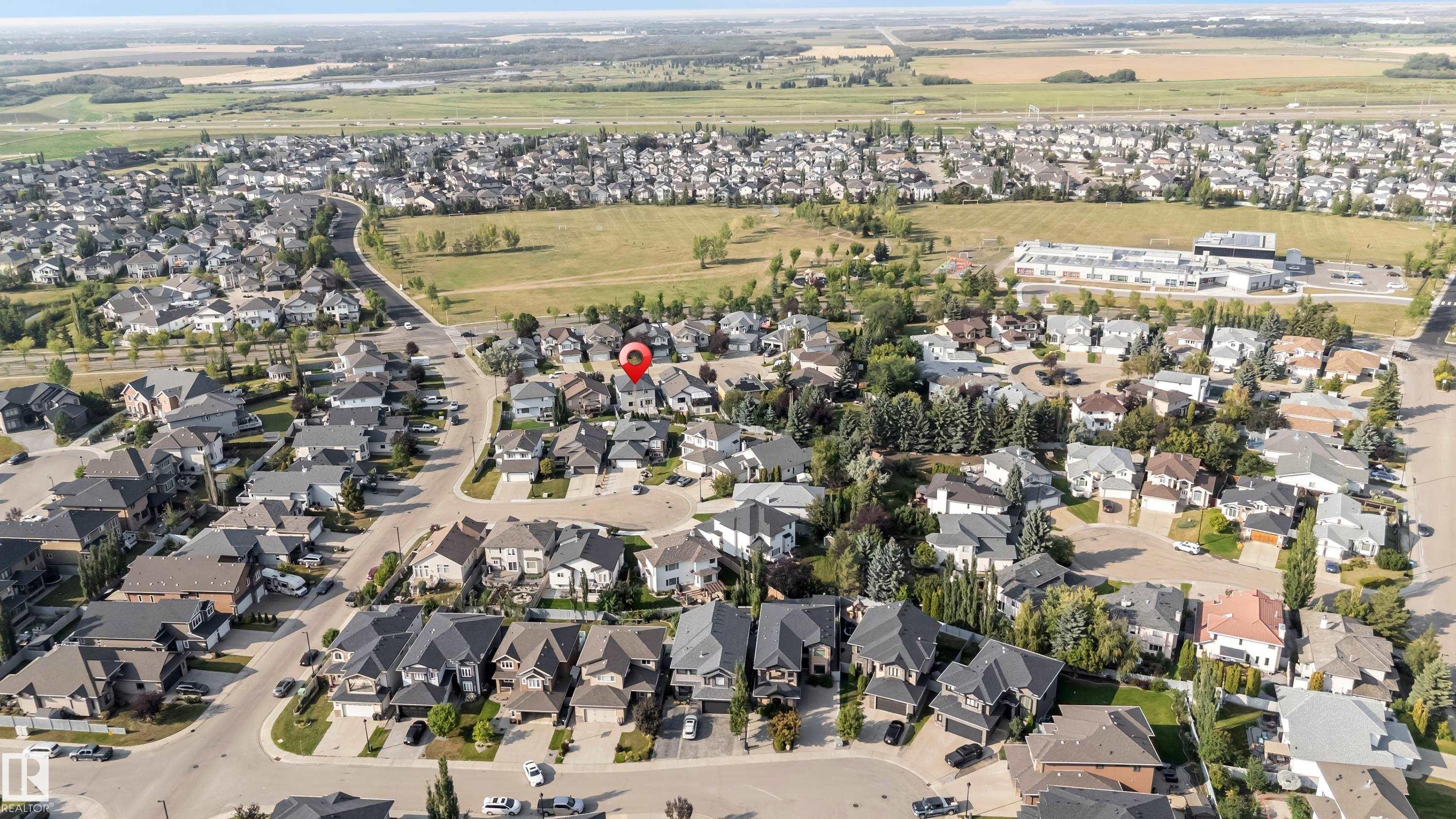 Aerial perspective showcasing a residential neighborhood with varied architectural styles - 10621 175A Avenue, Edmonton, AB