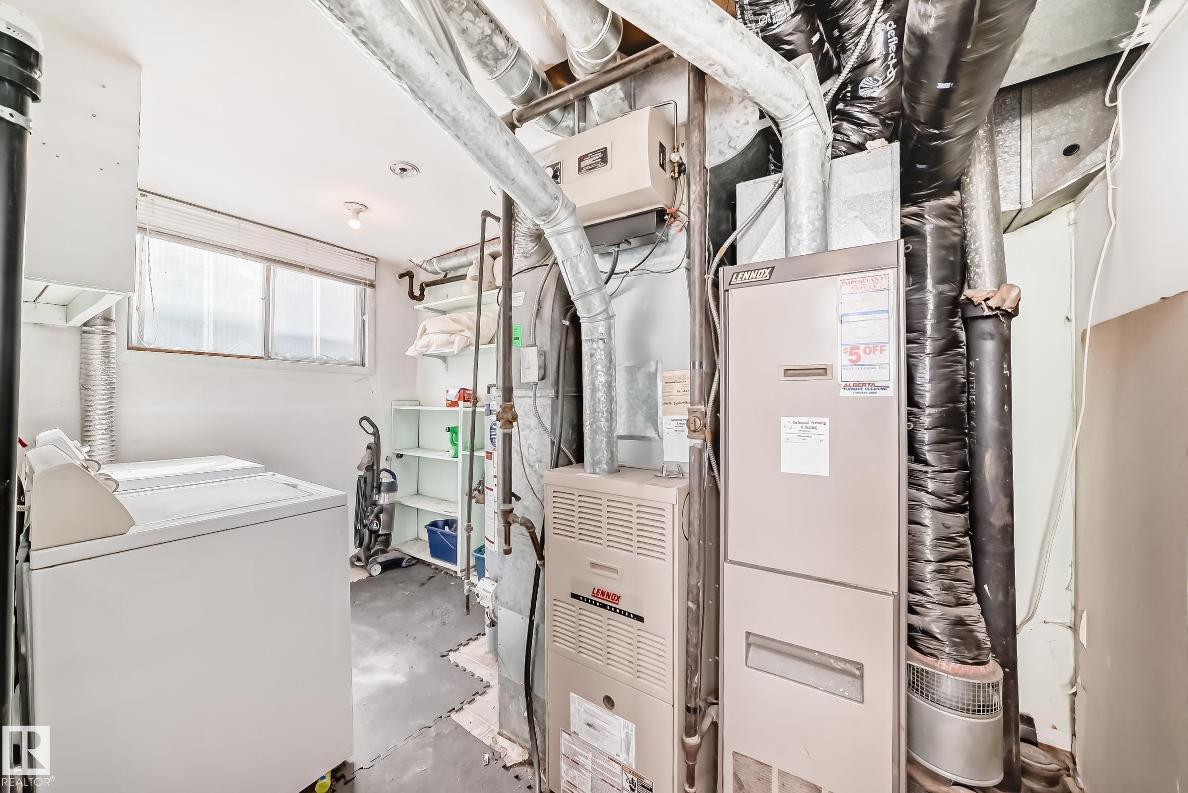 Dedicated utility room with two horizontal windows - 12825 102 Street, Edmonton, AB - Indoor