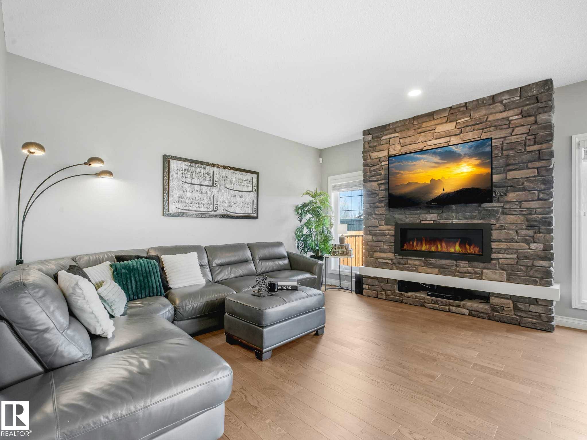 8427 216 Street, Edmonton, AB - Indoor Photo Showing Living Room With Fireplace