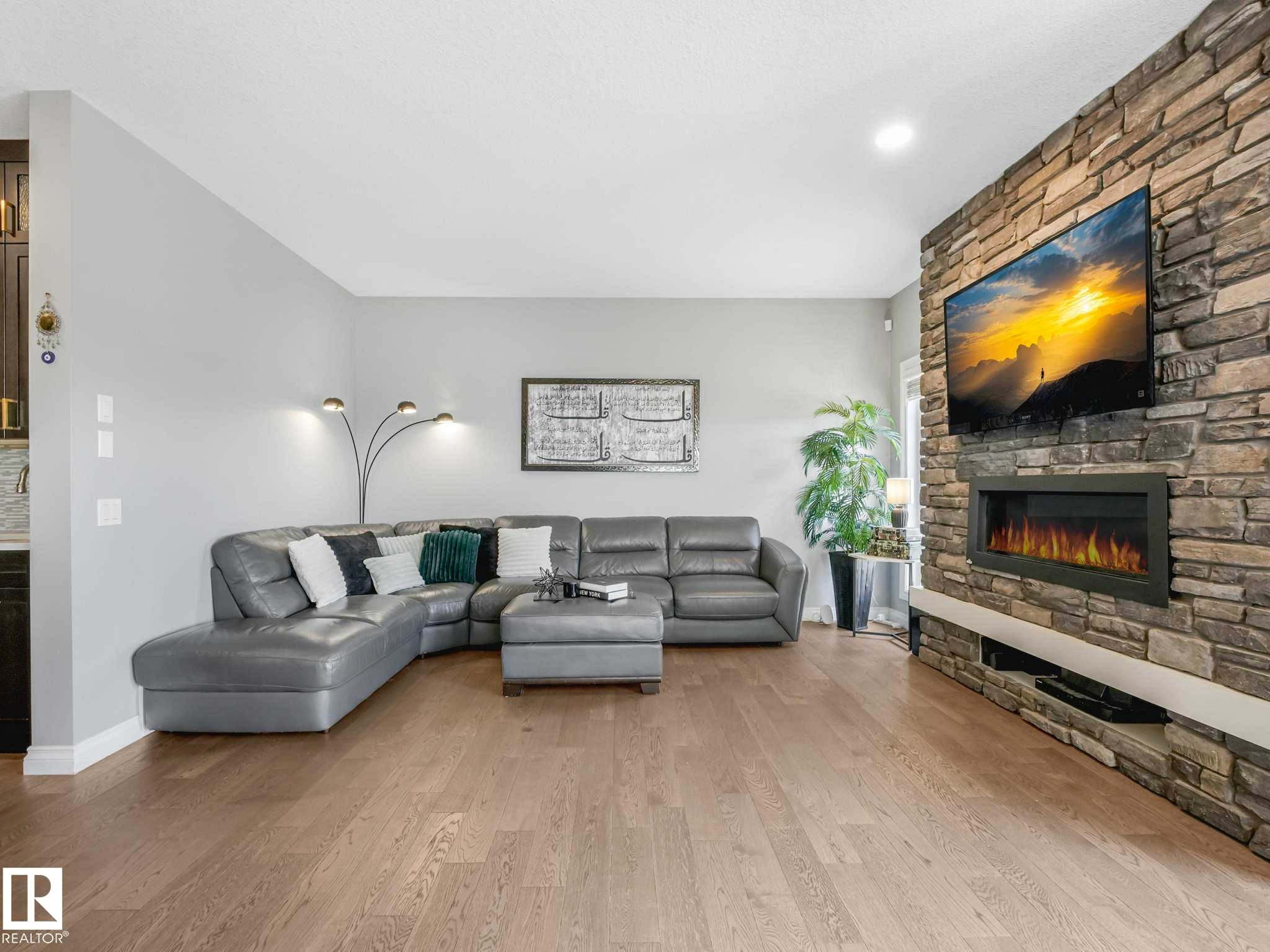 8427 216 Street, Edmonton, AB - Indoor Photo Showing Living Room With Fireplace