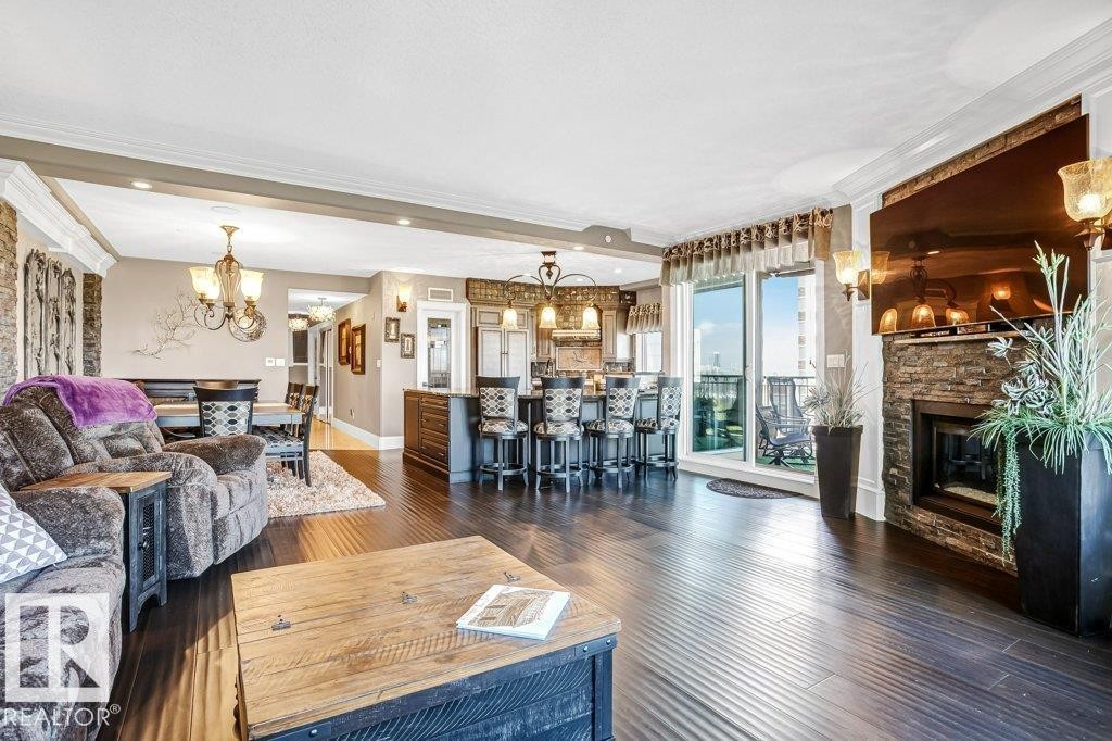 602 8728 Gateway Boulevard, Edmonton, AB - Indoor Photo Showing Living Room With Fireplace