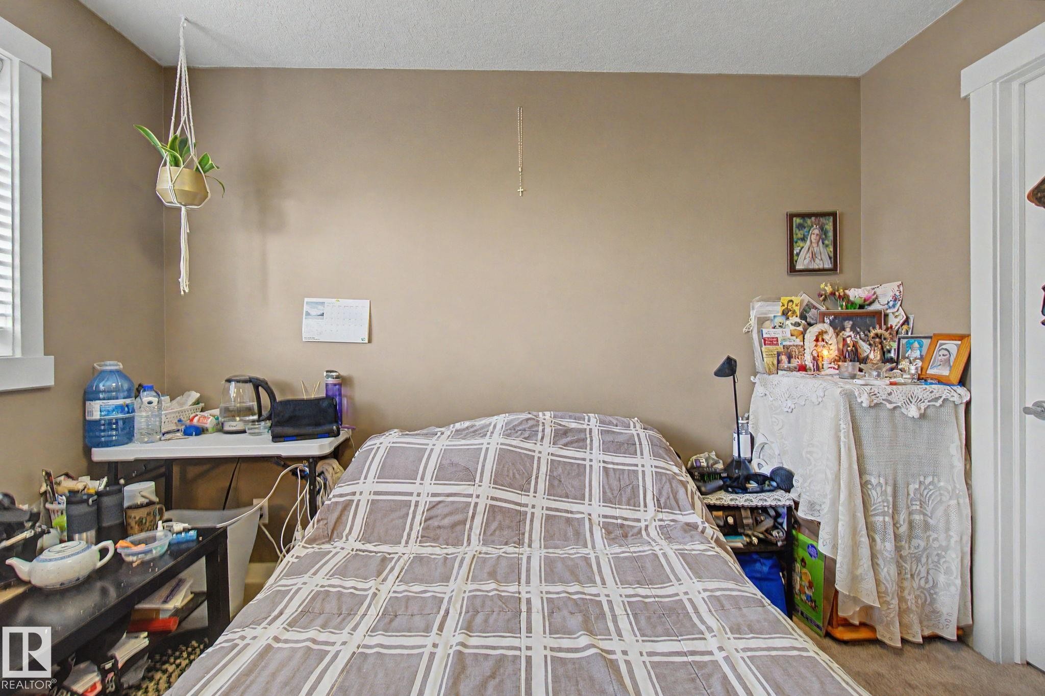 Image quality insufficient for description - 210 401 Southfork Drive, Leduc, AB - Indoor Photo Showing Bedroom