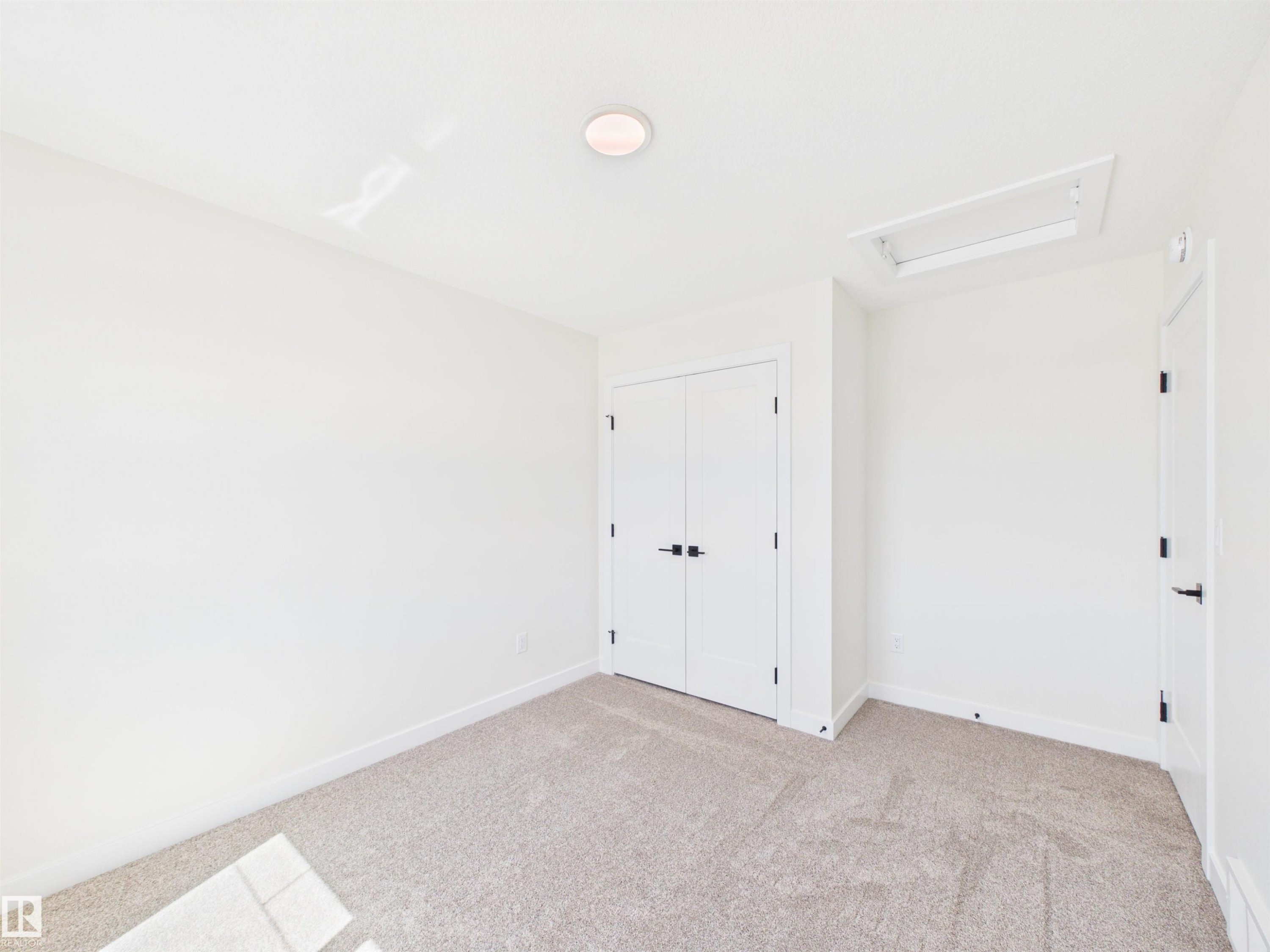 407 Brickyard Point(E), Stony Plain, AB - Indoor Photo Showing Other Room