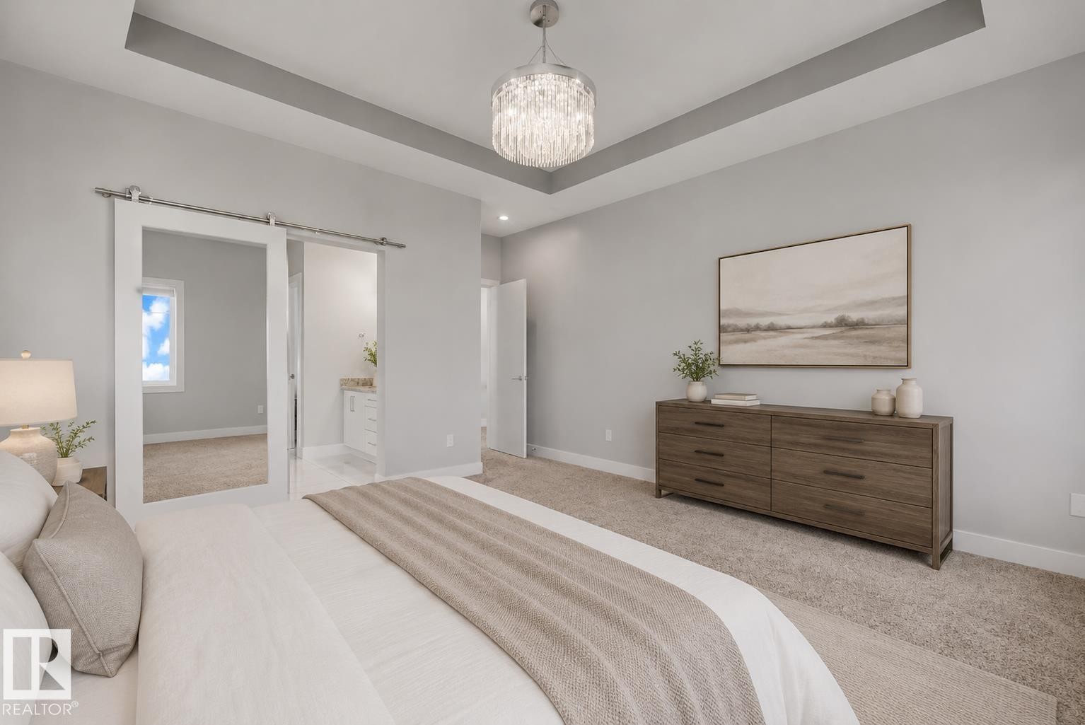 Spacious bedroom featuring a tray ceiling, recessed lighting, carpet flooring, and white barn doors. Virtually Staged. - 635 42 Street, Edmonton, AB - Indoor Photo Showing Bedroom