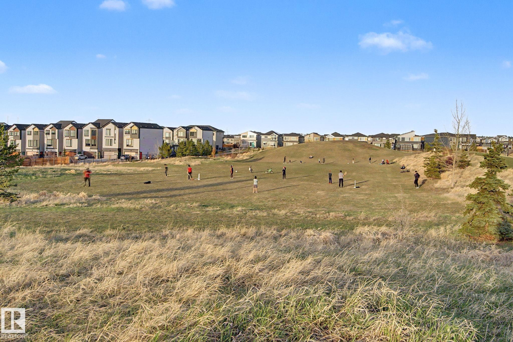 Expansive open green space with varied terrain and established coniferous trees - 635 42 Street, Edmonton, AB - Outdoor With View