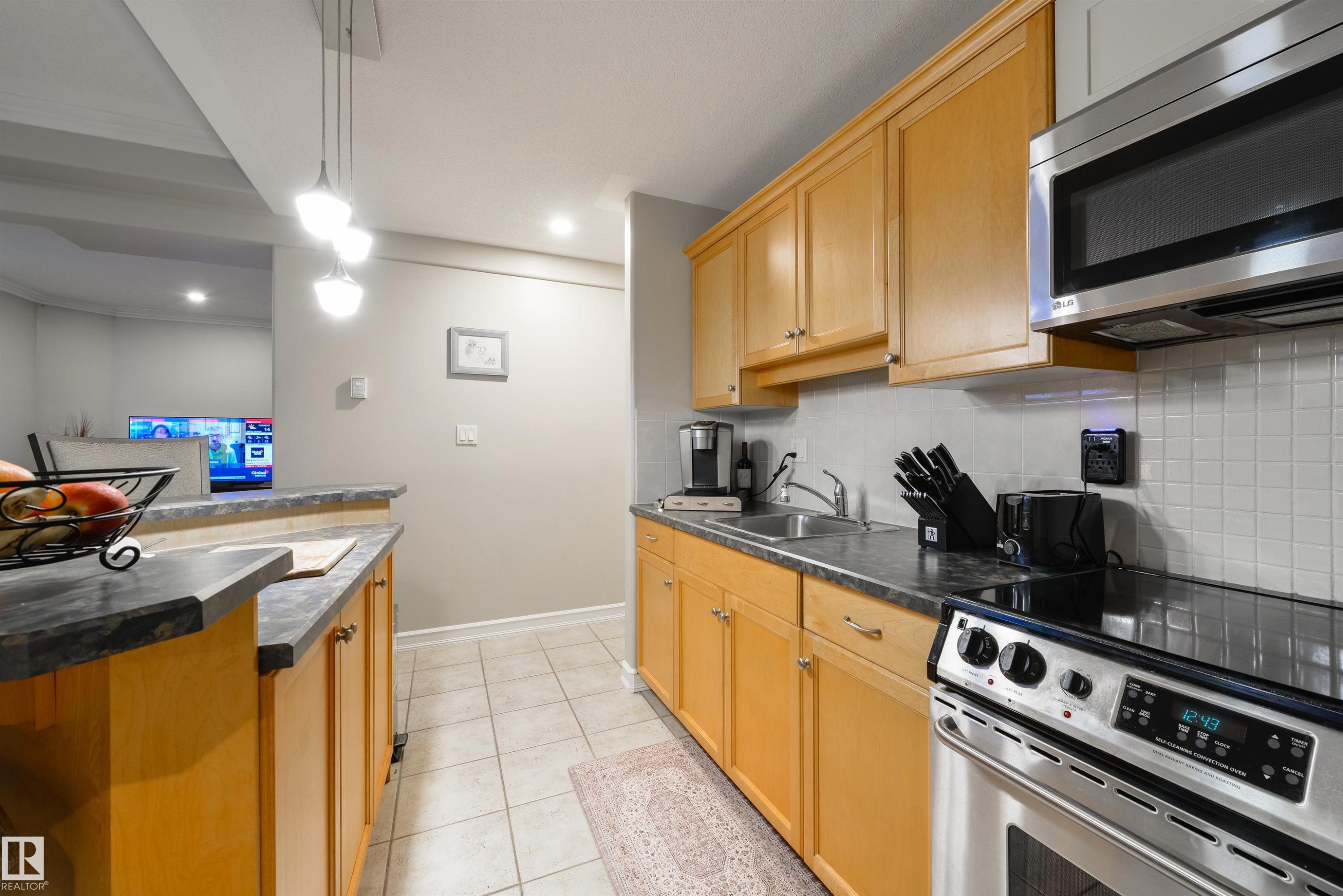 11304 9 Avenue, Edmonton, AB - Indoor Photo Showing Kitchen With Double Sink