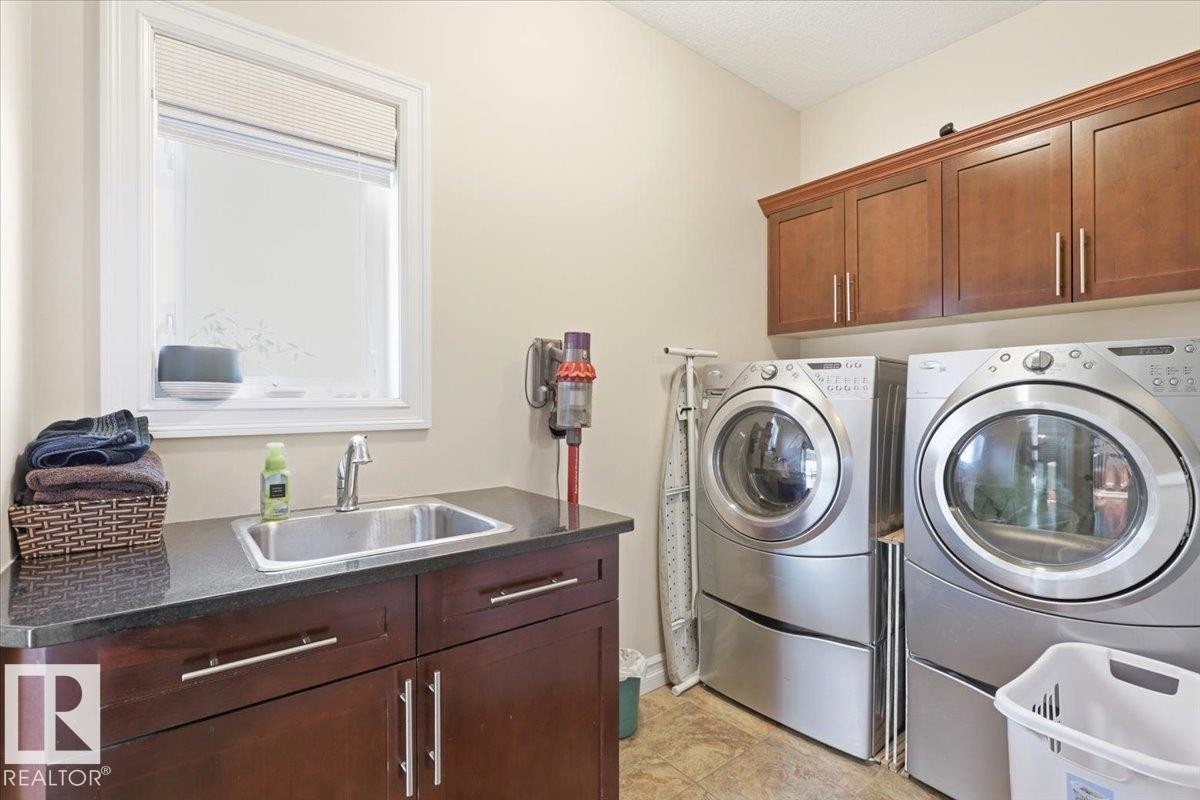 30 Ravine Drive, Devon, AB - Indoor Photo Showing Laundry Room