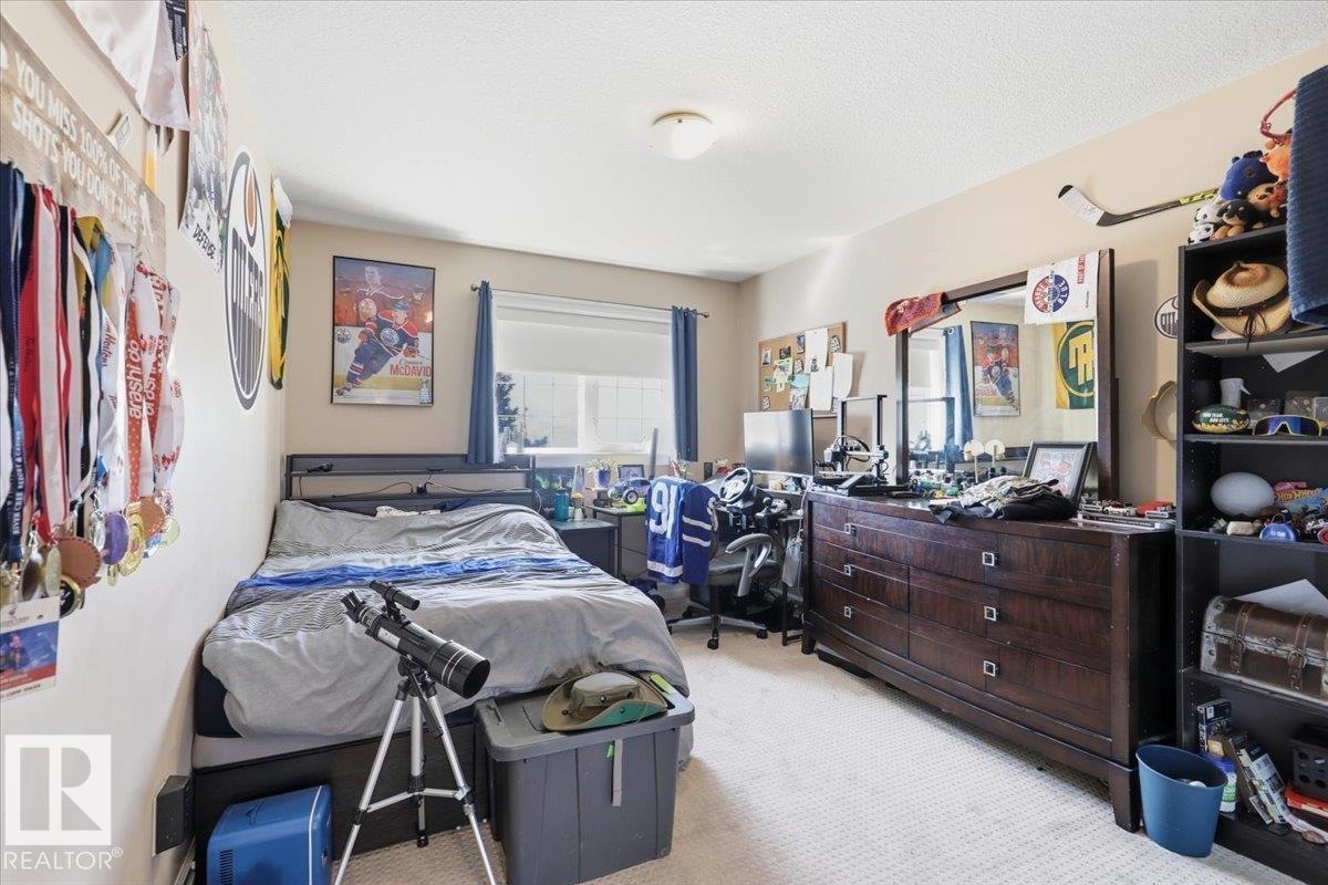 30 Ravine Drive, Devon, AB - Indoor Photo Showing Bedroom