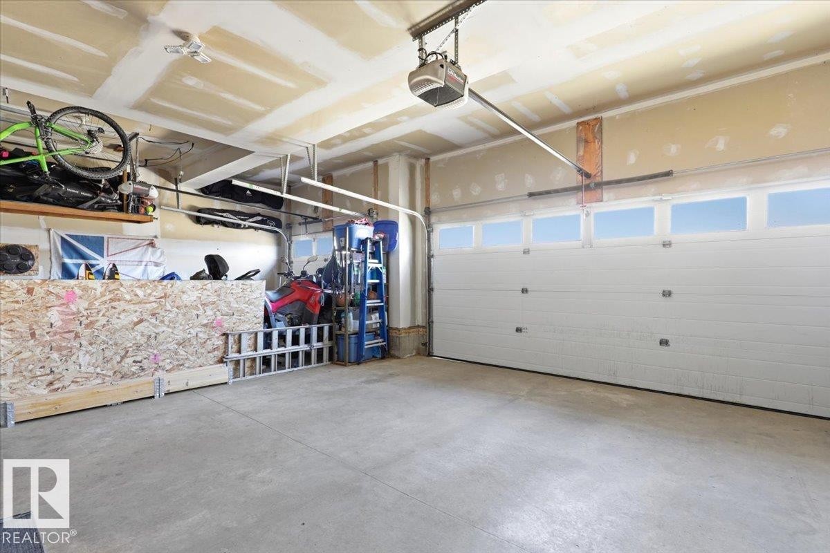 30 Ravine Drive, Devon, AB - Indoor Photo Showing Garage