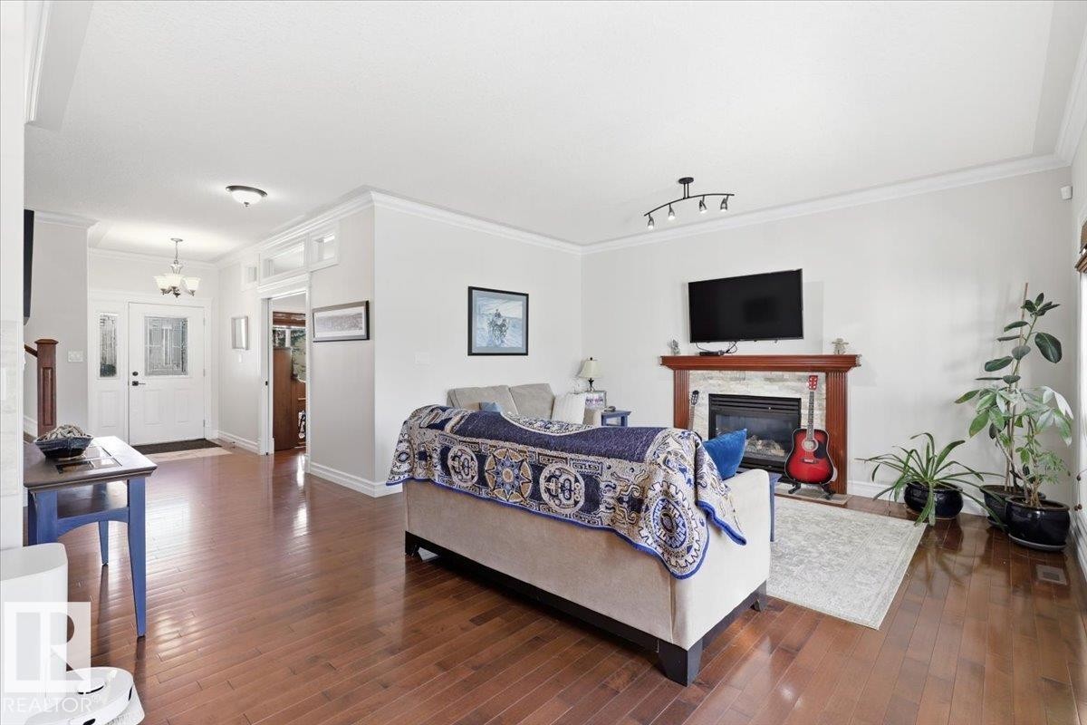 30 Ravine Drive, Devon, AB - Indoor With Fireplace