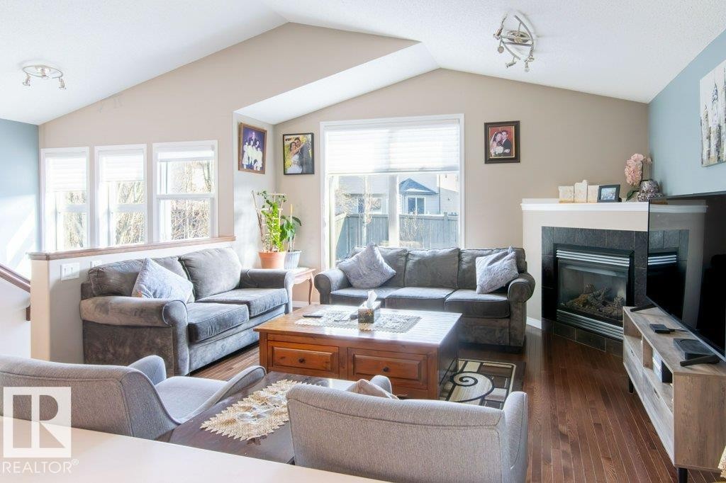 6103 5 Avenue, Edmonton, AB - Indoor Photo Showing Living Room With Fireplace