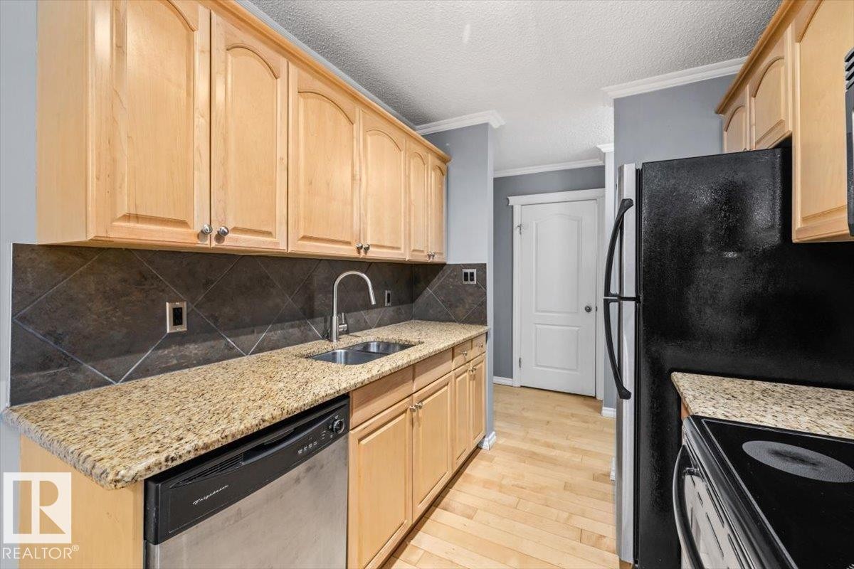 201 10547 83 Avenue, Edmonton, AB - Indoor Photo Showing Kitchen With Double Sink