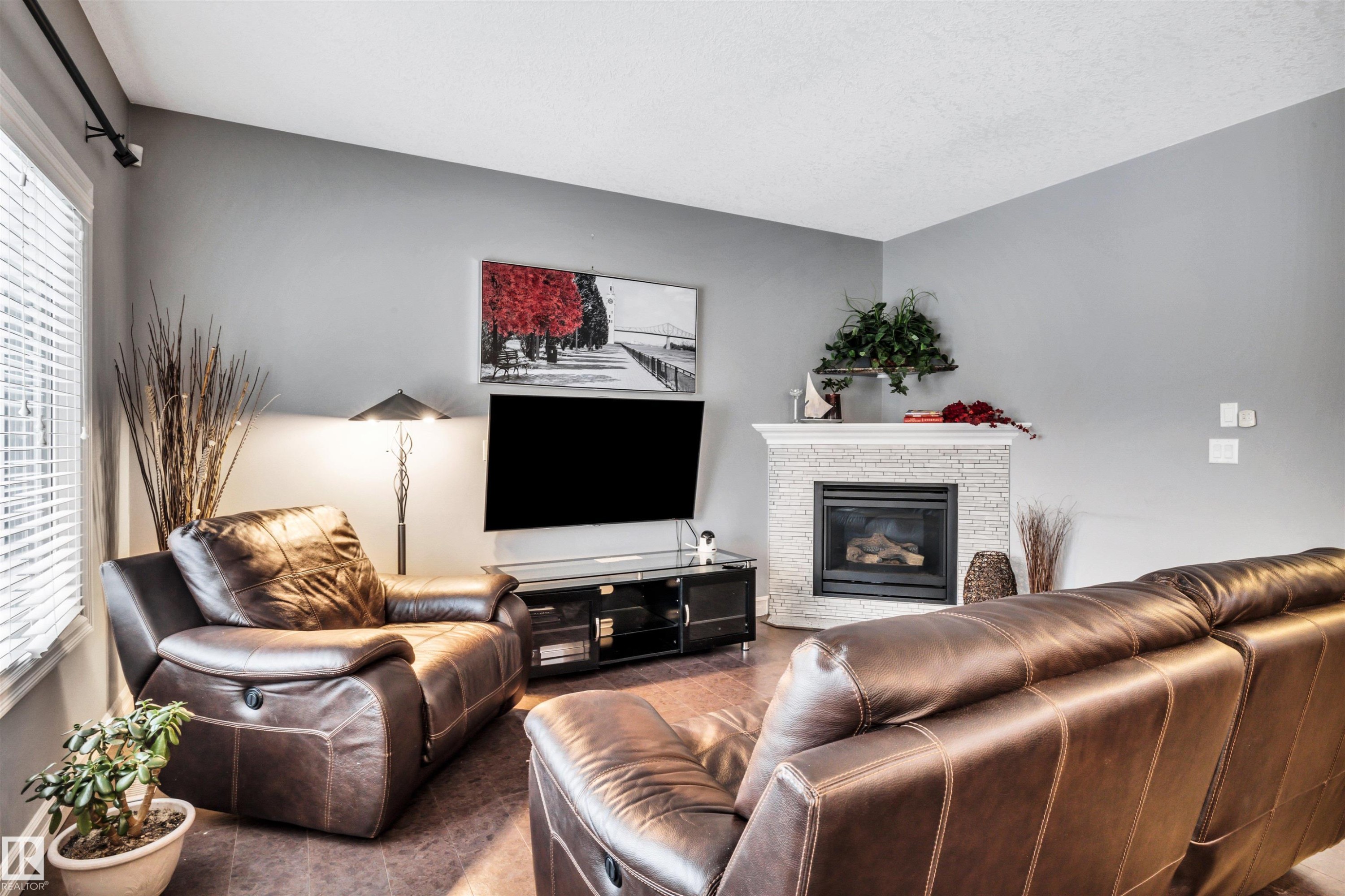 7728 18 Avenue, Edmonton, AB - Indoor Photo Showing Living Room With Fireplace