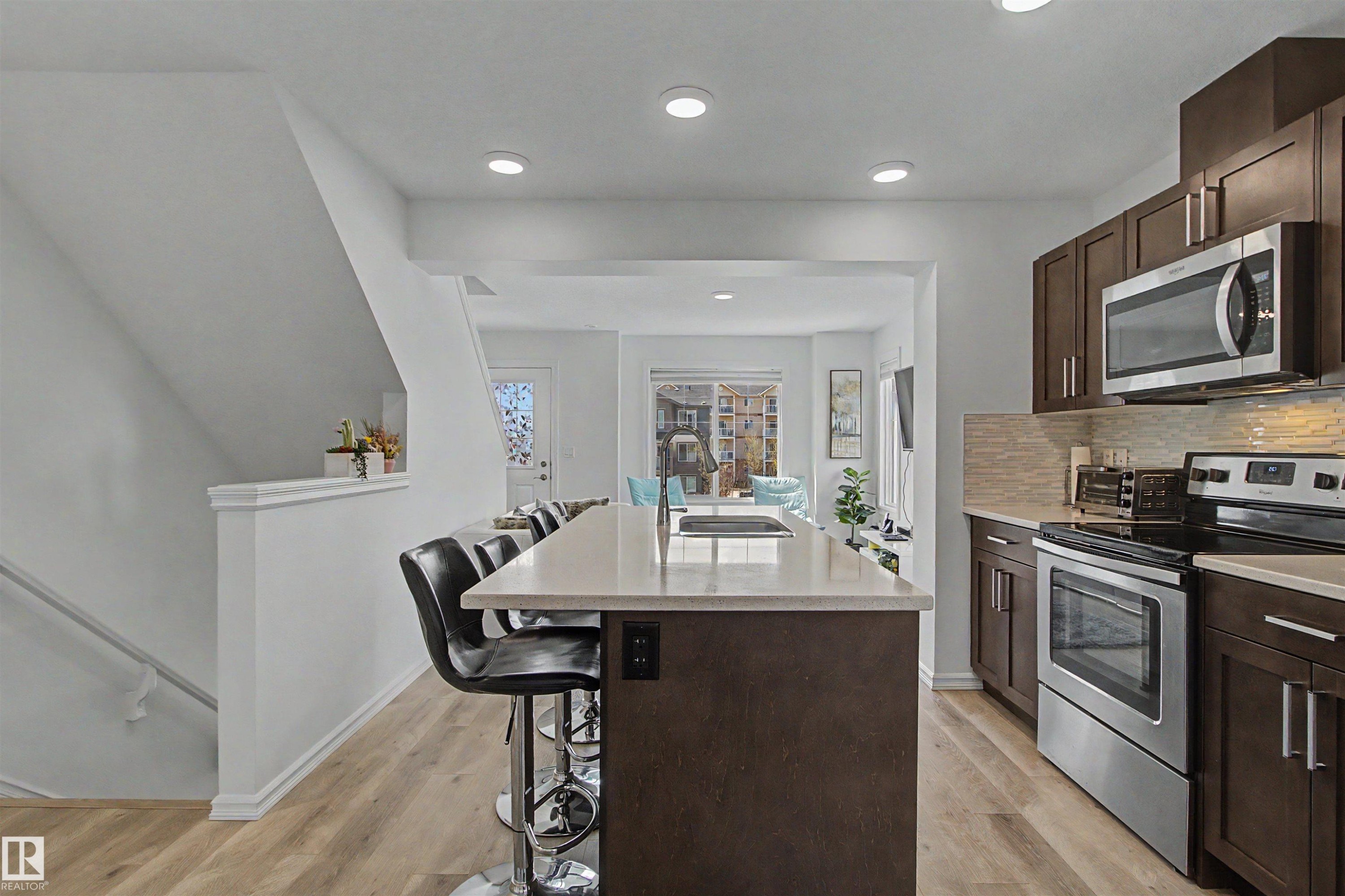#30 3025 151 Av Nw, Edmonton, AB - Indoor Photo Showing Kitchen With Stainless Steel Kitchen With Upgraded Kitchen
