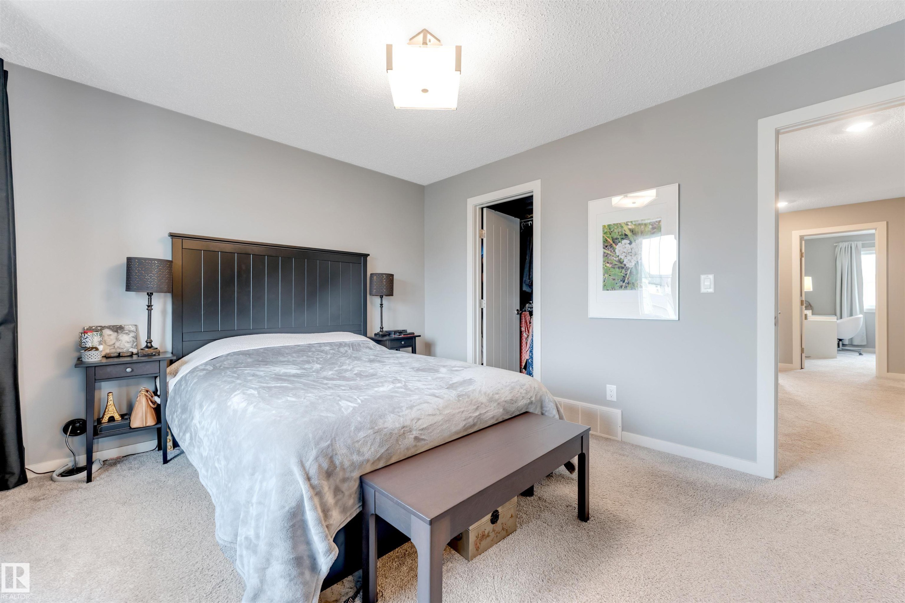 Carpeted room with a ceiling-mounted light fixture and light gray walls - 2652 Maple Way, Edmonton, AB - Indoor Photo Showing Bedroom