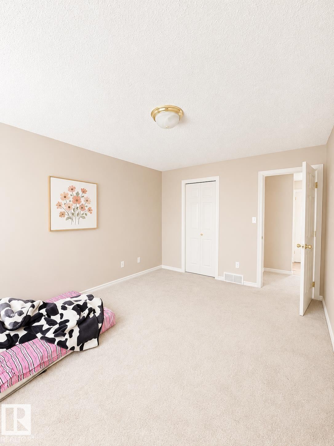 Wall-to-wall carpeting with light-toned walls and white trim - 704 83 Street, Edmonton, AB - Indoor Photo Showing Bedroom