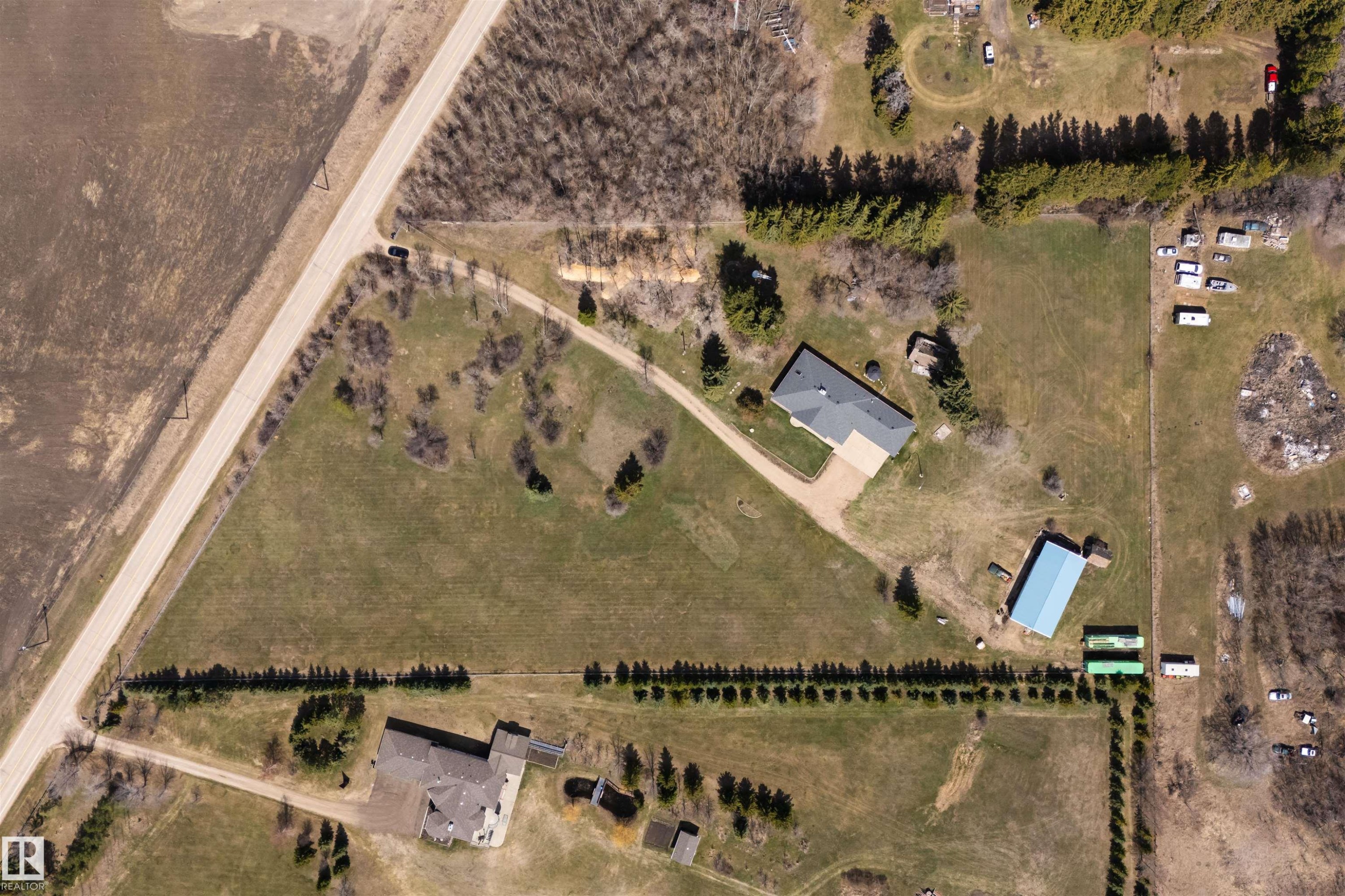 Aerial Survey. Documenting the property's structures and land use patterns - 19403 Fort Road, Edmonton, AB - With View