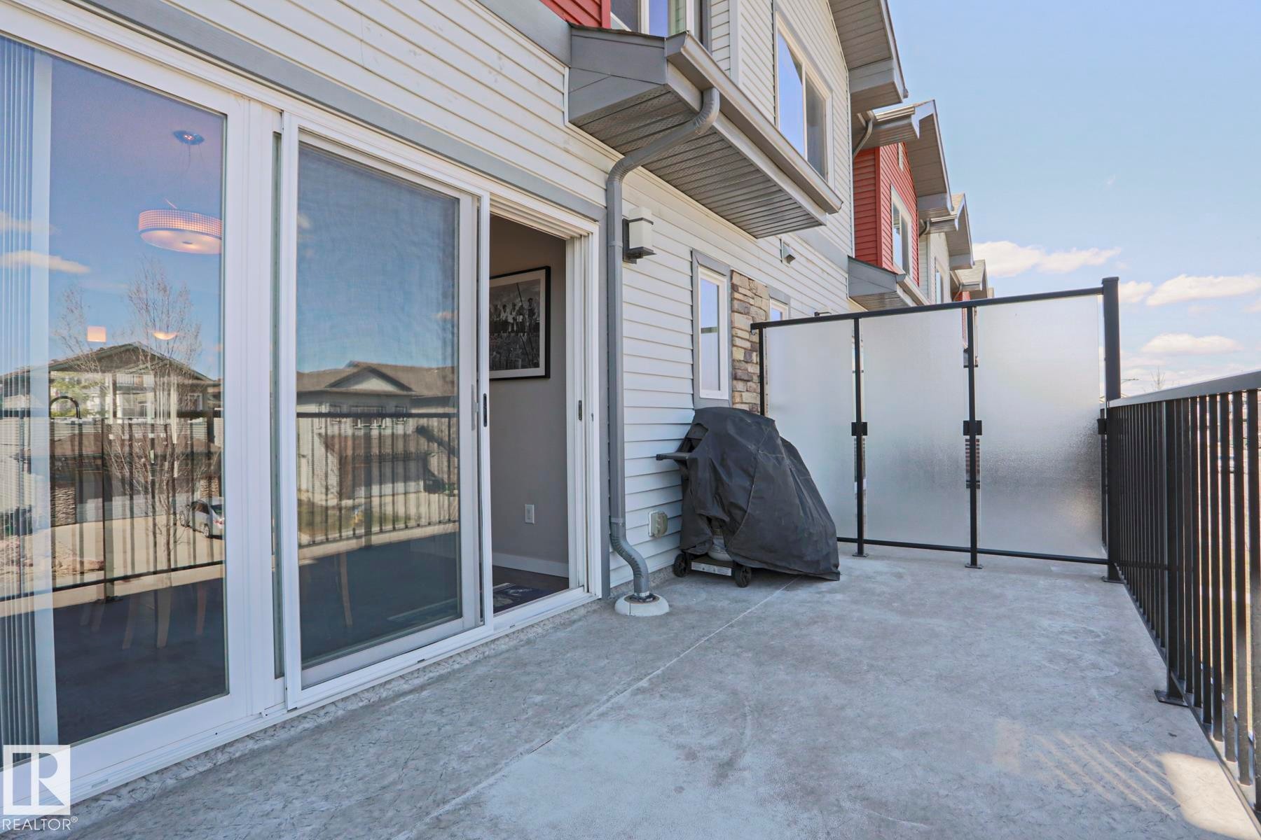 Bar B Q time all year round - 1622 33A Street Nw, Edmonton, AB - Outdoor With Balcony With Exterior