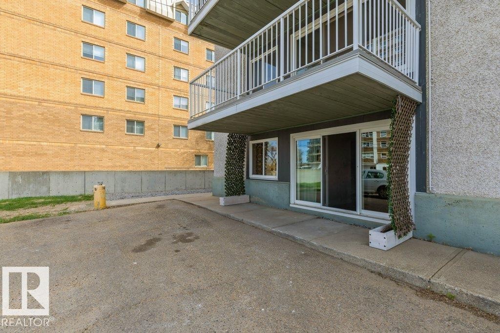 Parking right outside your door. - 101 8604 Gateway Boulevard, Edmonton, AB - Outdoor With Exterior
