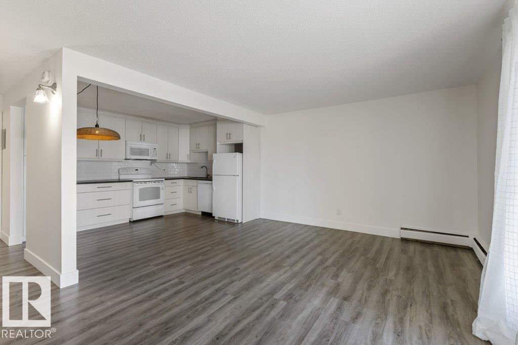 Open-concept living space; Carpet-Free Condo! - 101 8604 Gateway Boulevard, Edmonton, AB - Indoor