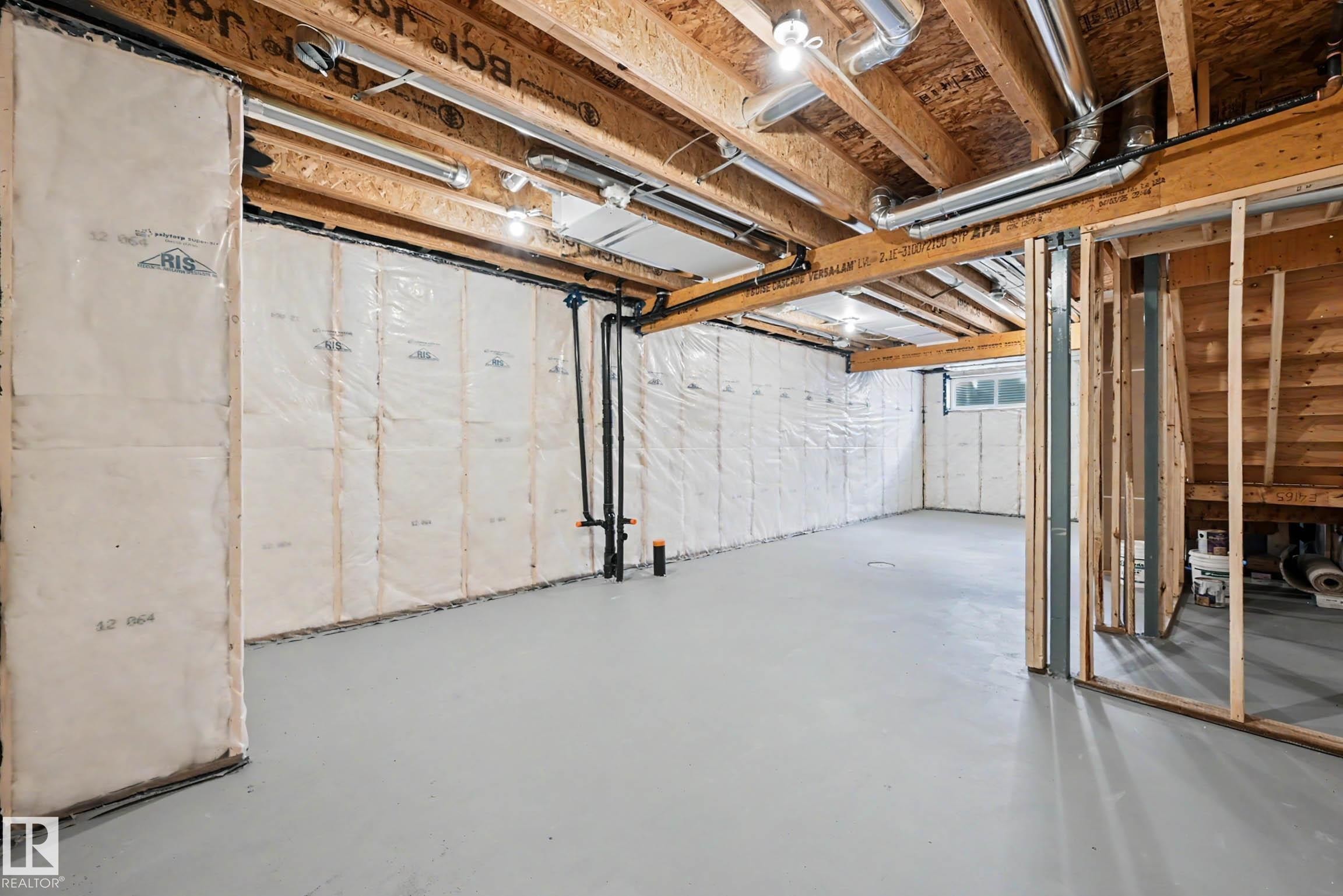 Unfinished basement offering ample space for future customization - 720 Southfork Drive, Leduc, AB - Indoor Photo Showing Basement