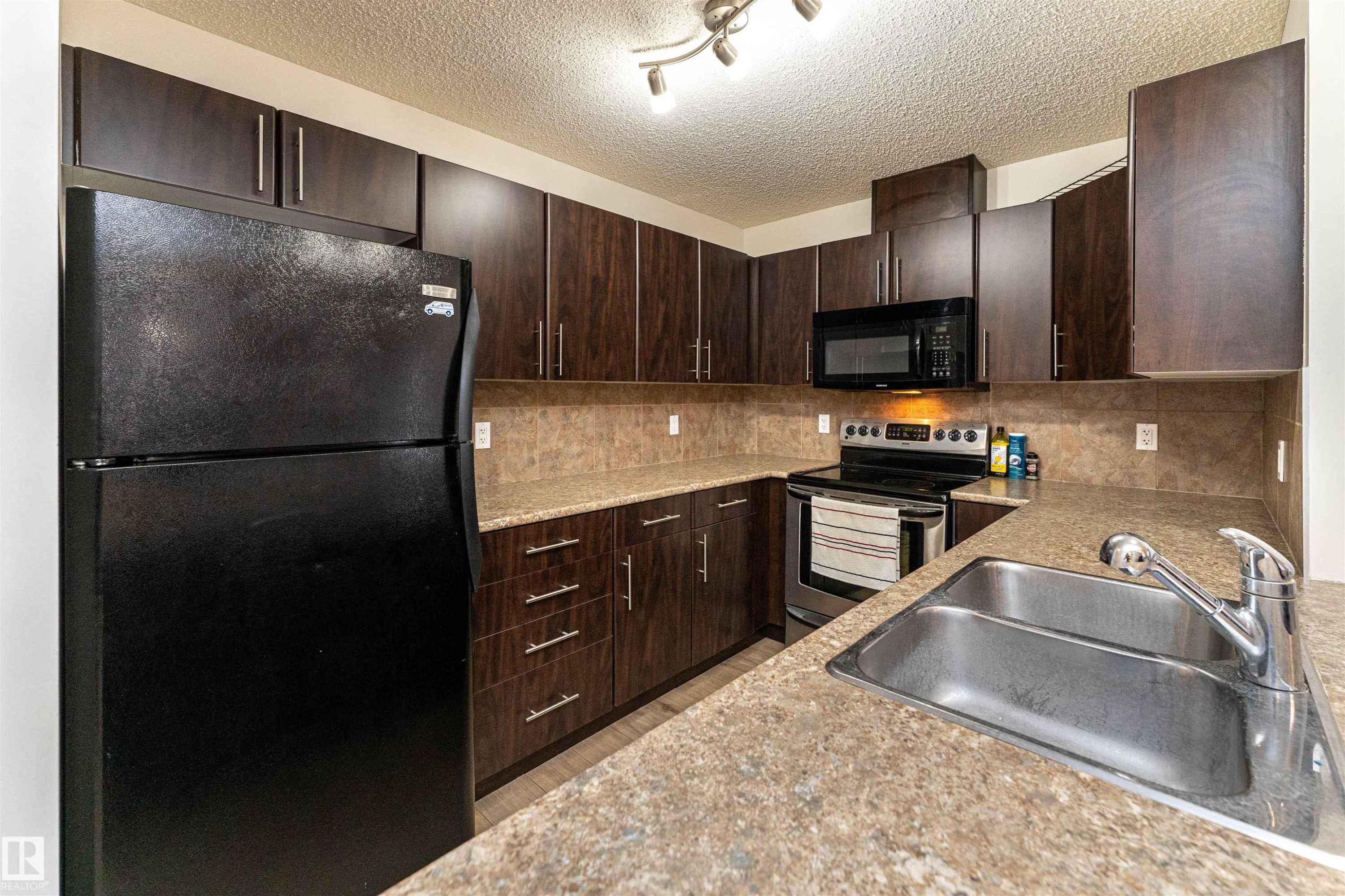 #108 103 Ambleside Dr Sw, Edmonton, AB - Indoor Photo Showing Kitchen With Double Sink