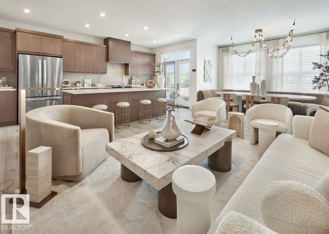 Living room featuring recessed lighting and a textured ceiling - 2131 194 Street Nw, Edmonton, AB - Indoor Photo Showing Dining Room