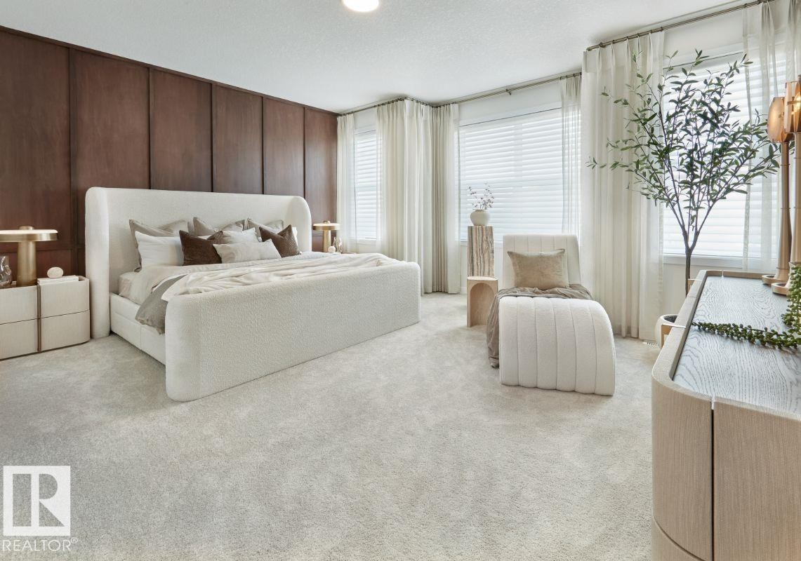 Bedroom with carpet flooring and a textured ceiling - 2131 194 Street Nw, Edmonton, AB - Indoor Photo Showing Bedroom