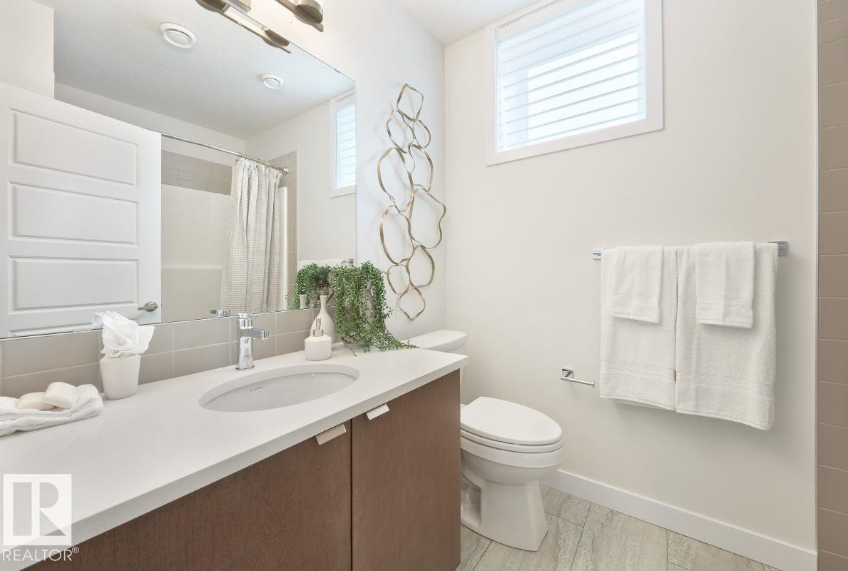 Full bath with vanity and a shower with shower curtain - 2131 194 Street Nw, Edmonton, AB - Indoor Photo Showing Bathroom