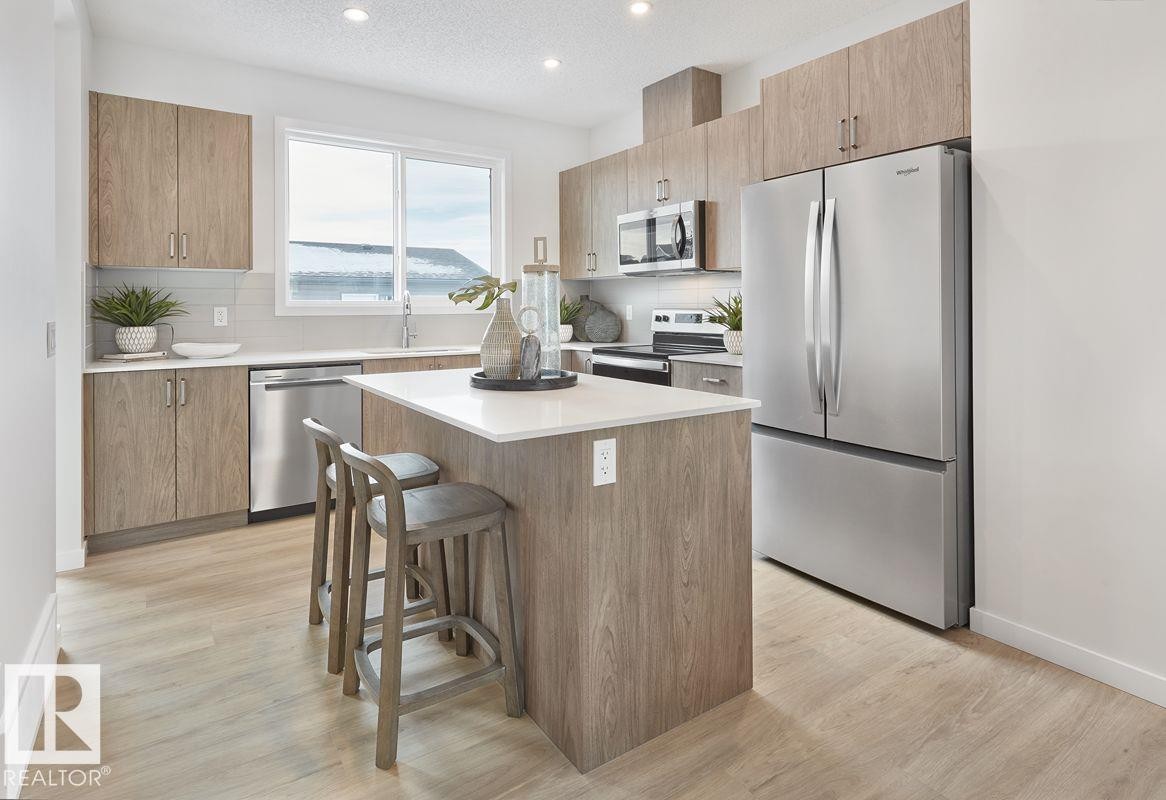 307 173 Avenue Nw, Edmonton, AB - Indoor Photo Showing Kitchen With Upgraded Kitchen