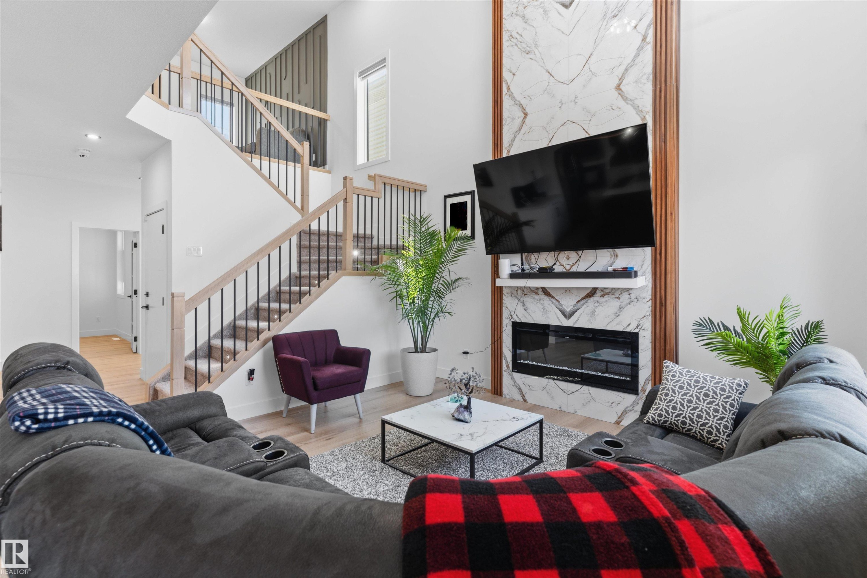 439 Roberts Cres, Leduc, AB - Indoor Photo Showing Living Room With Fireplace