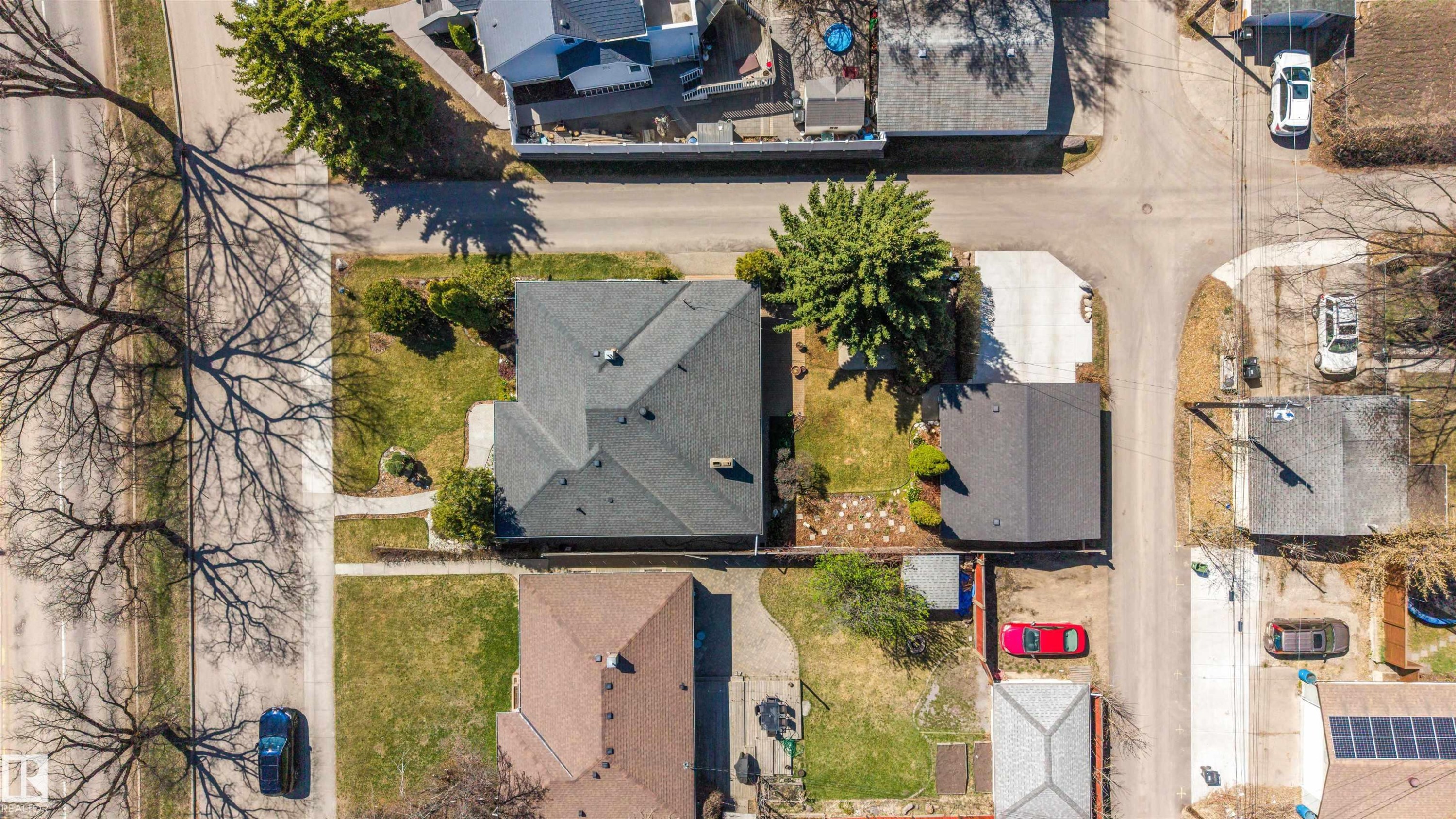 Residential property with a dark shingle roof, situated on a corner lot - 9602 85 Street, Edmonton, AB