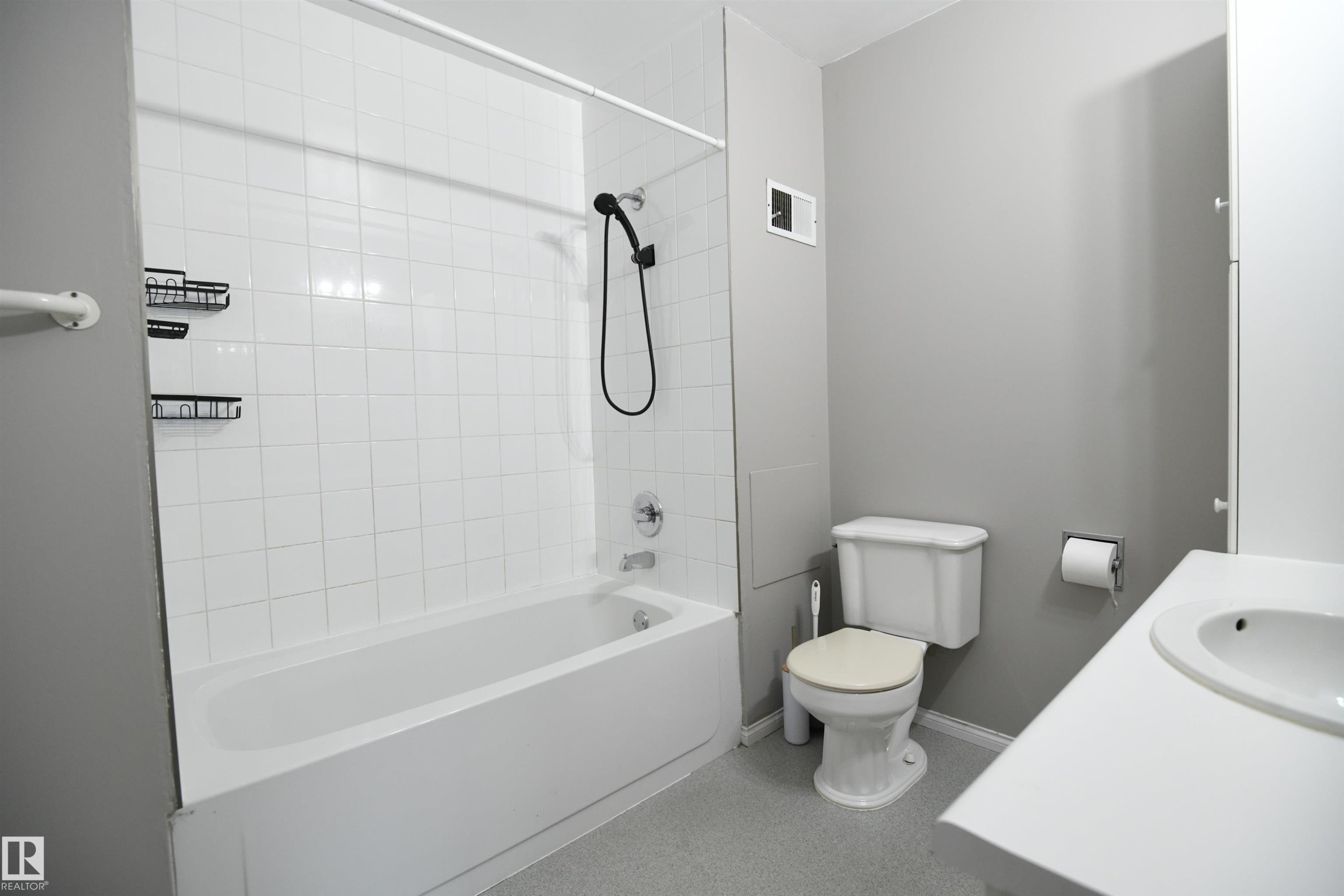 The main bathroom on the top floor serves both the 2nd and 3rd bedrooms via the hallway door, but also doubles as a private ensuite for the master bedroom, via it's own private door. Another nice touch - 6706 36A Avenue, Edmonton, AB - Indoor Photo Showing Bathroom