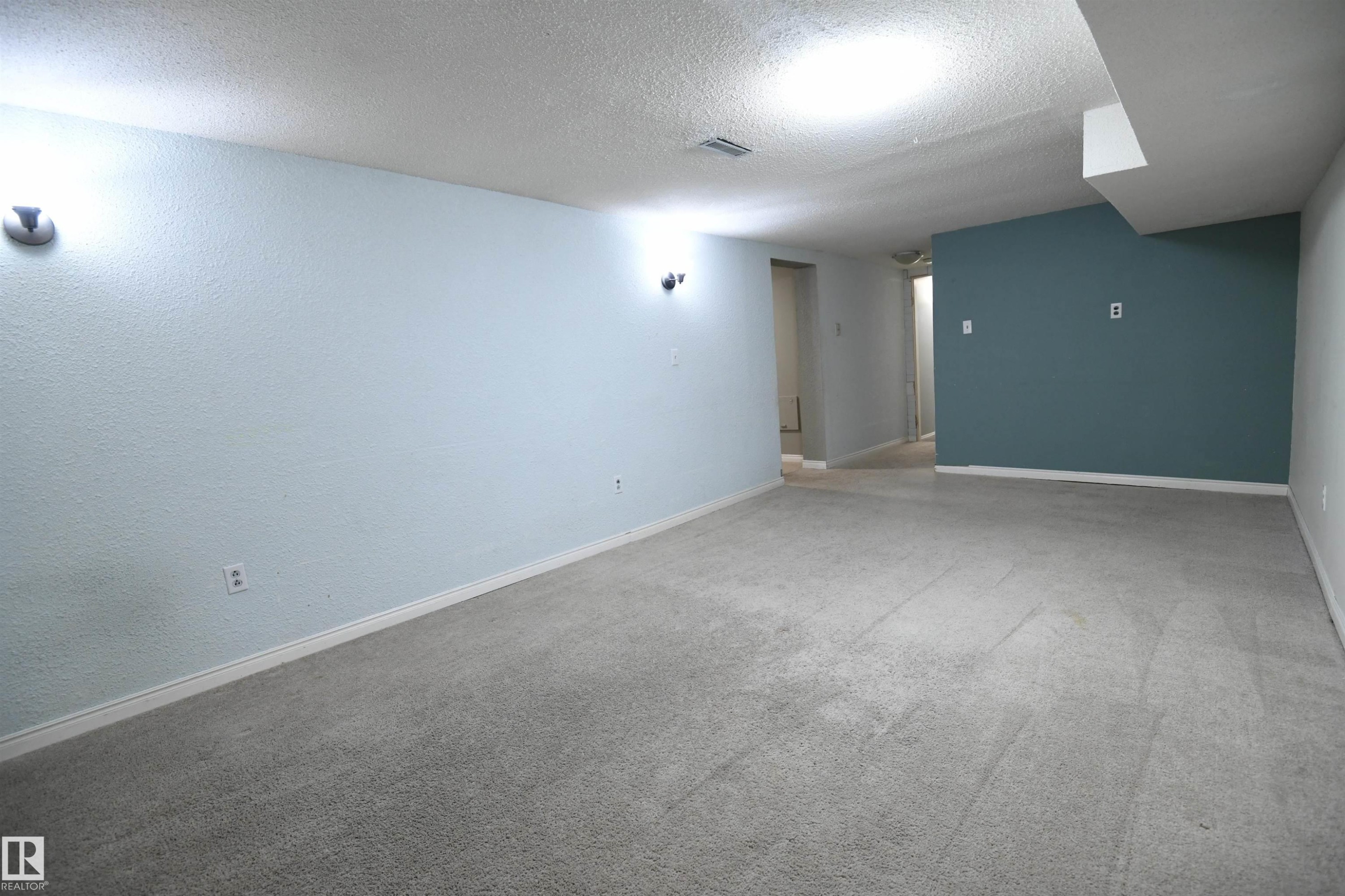 Large rec rooms are great, and give a family a second entertaining space. Whether for gaming, enjoying movies, or having guests over, this is a great space. An additional den/office is also located adjacent to this room - 6706 36A Avenue, Edmonton, AB - Indoor