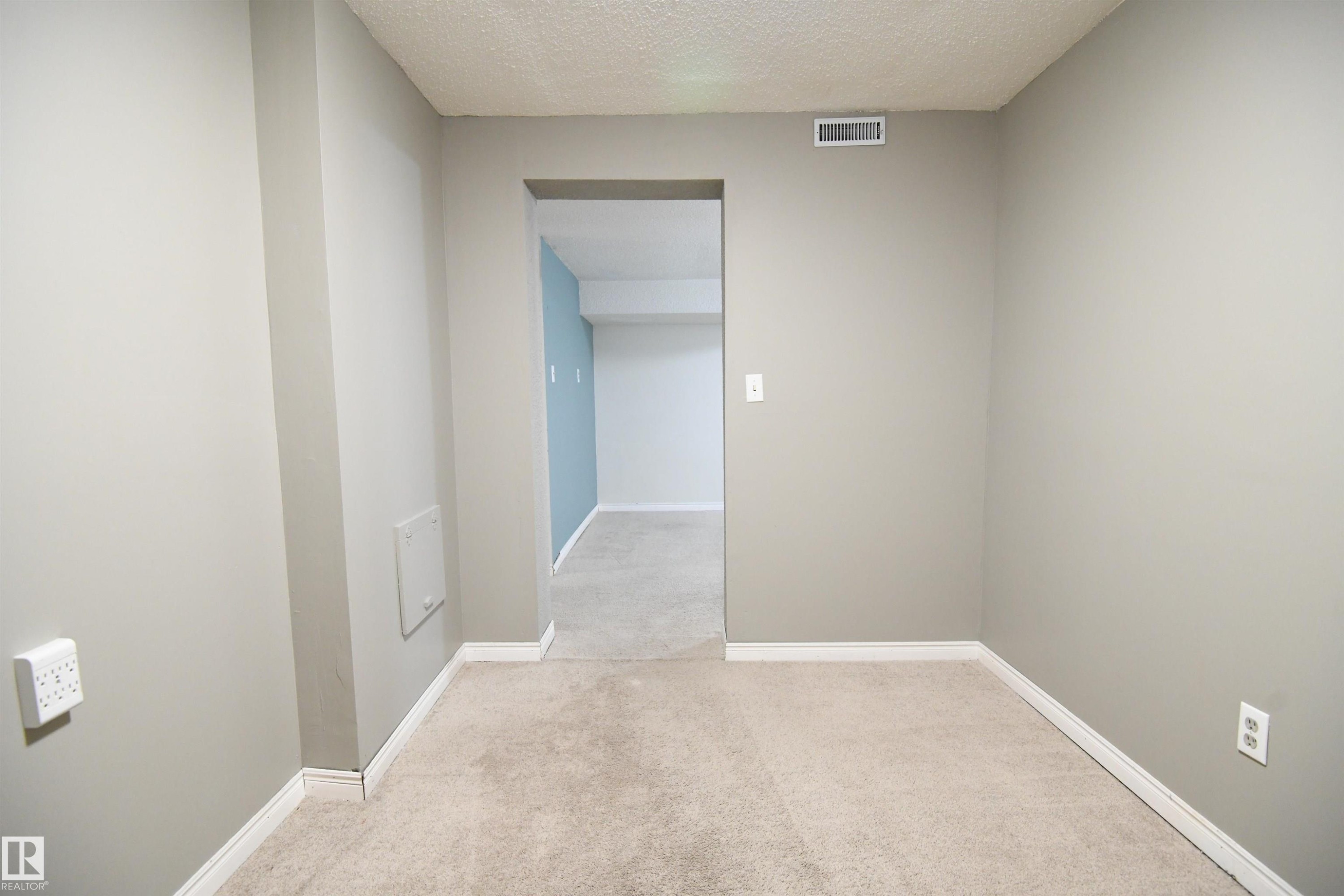 This additional room downstairs makes a great den or office, and has some additional storage space in it's closet. This home uses all of it's space very efficiently, and provides great utility - 6706 36A Avenue, Edmonton, AB - Indoor Photo Showing Other Room