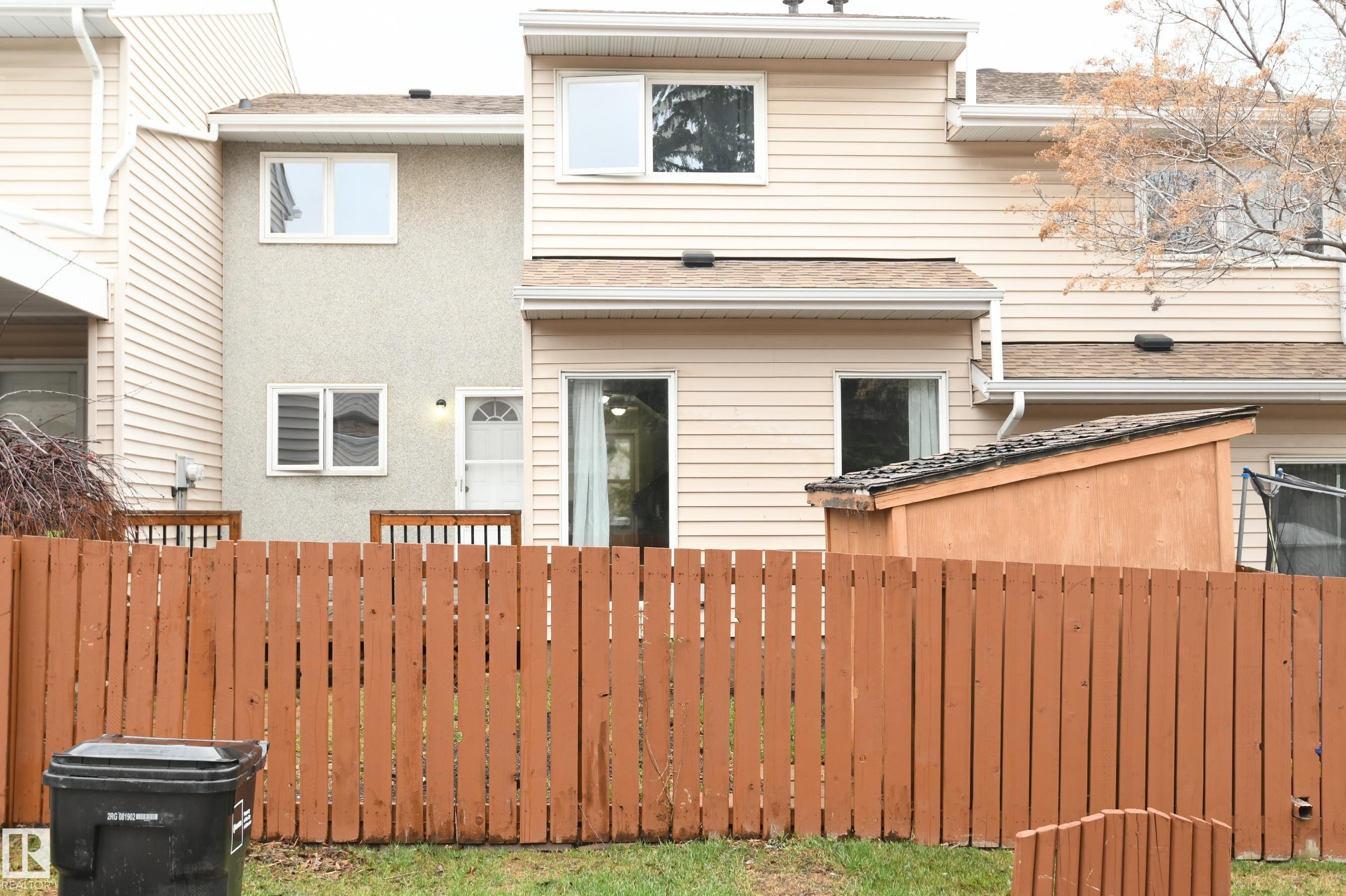 You will typically enter this unit via the private front door, but the home does have a full conventional rear yard, and a paved lane access that serves the rear of the property as well. A welcome step up - 6706 36A Avenue, Edmonton, AB - Outdoor With Exterior