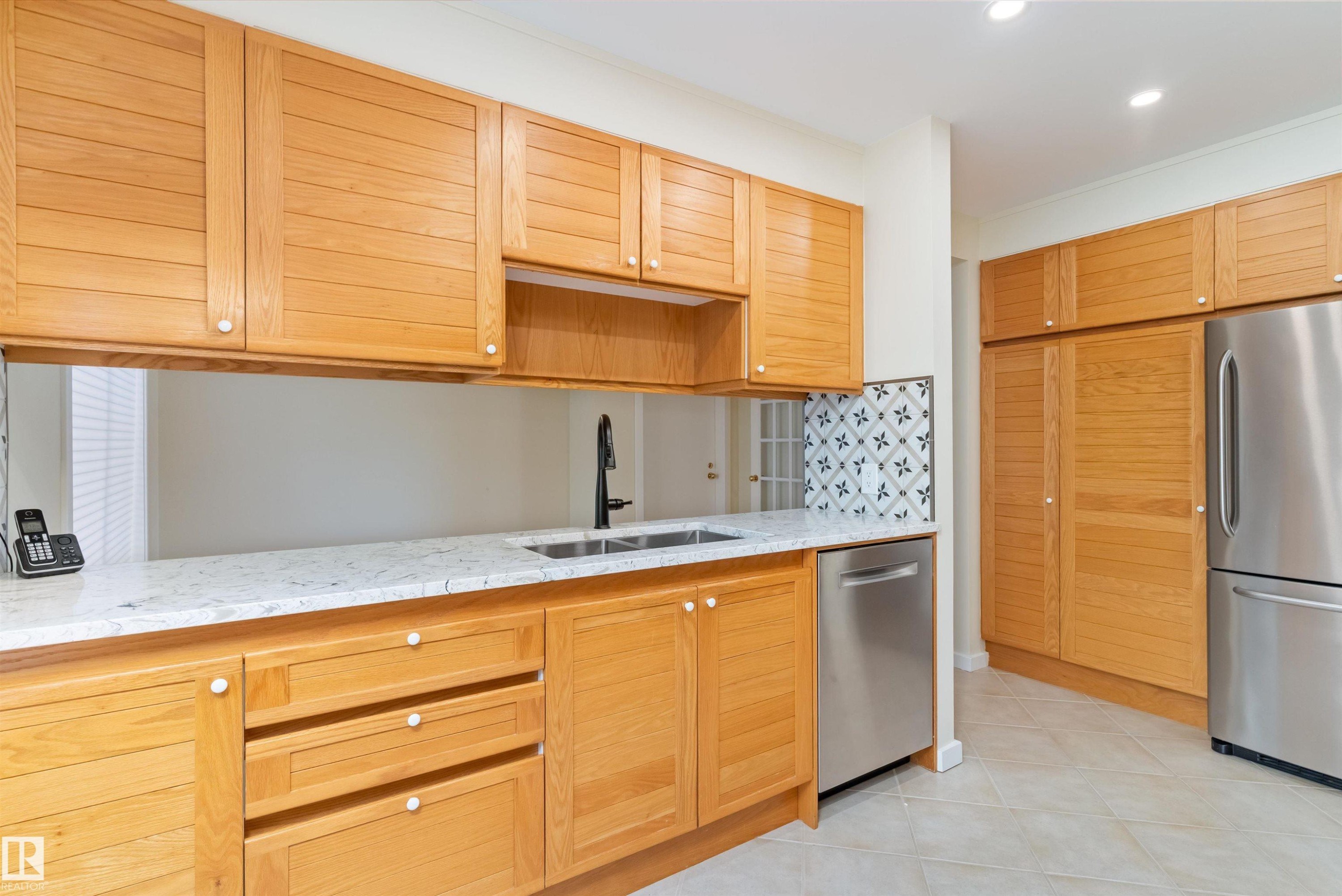 7 14824 45 Avenue, Edmonton, AB - Indoor Photo Showing Kitchen With Stainless Steel Kitchen With Double Sink