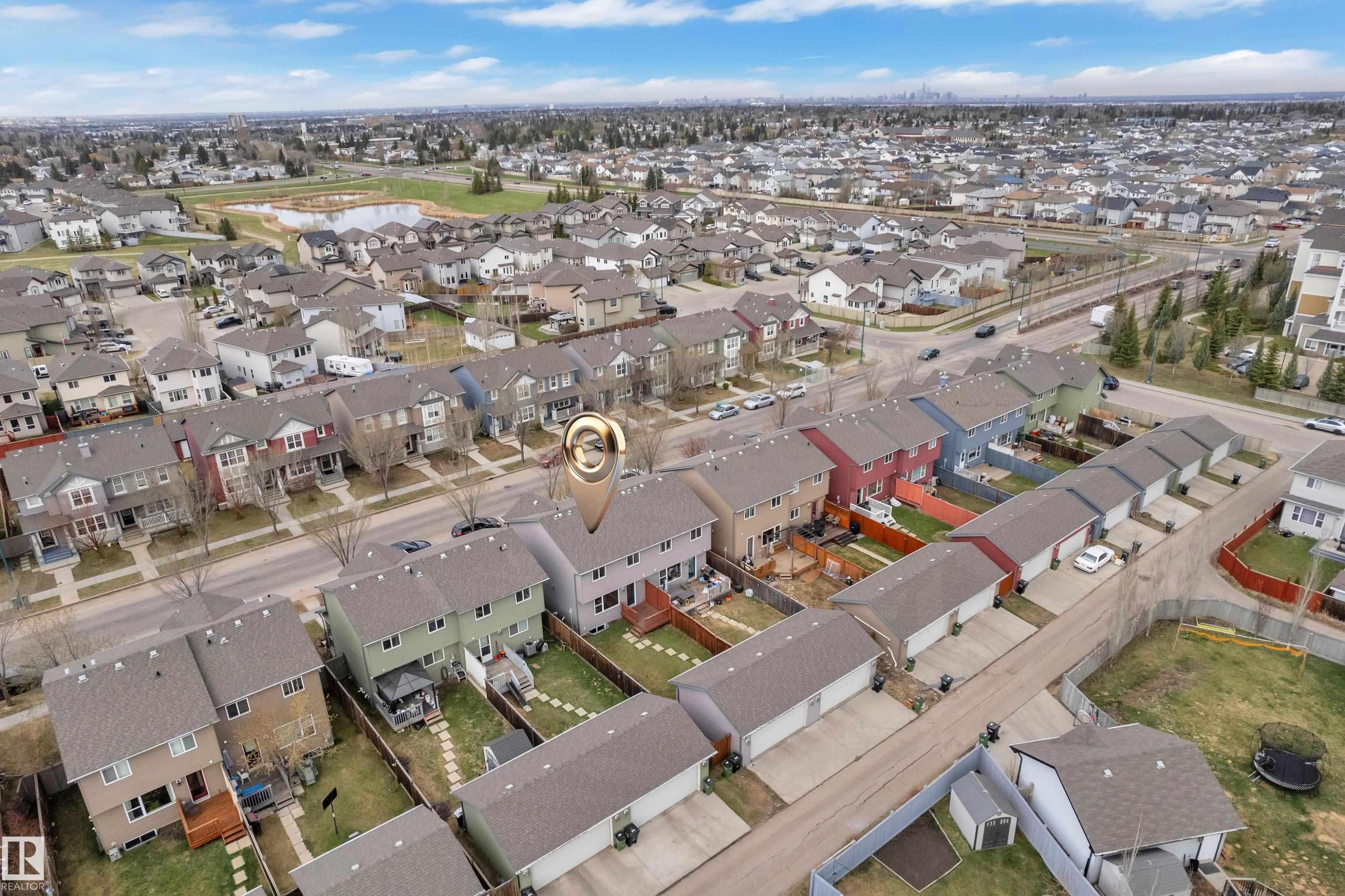 Residential neighborhood featuring a variety of detached and attached homes with individual backyards and garages - 2143 32 Street, Edmonton, AB