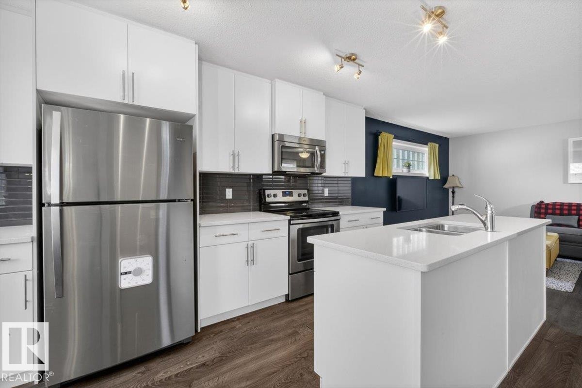 14835 103 Avenue, Edmonton, AB - Indoor Photo Showing Kitchen With Double Sink With Upgraded Kitchen