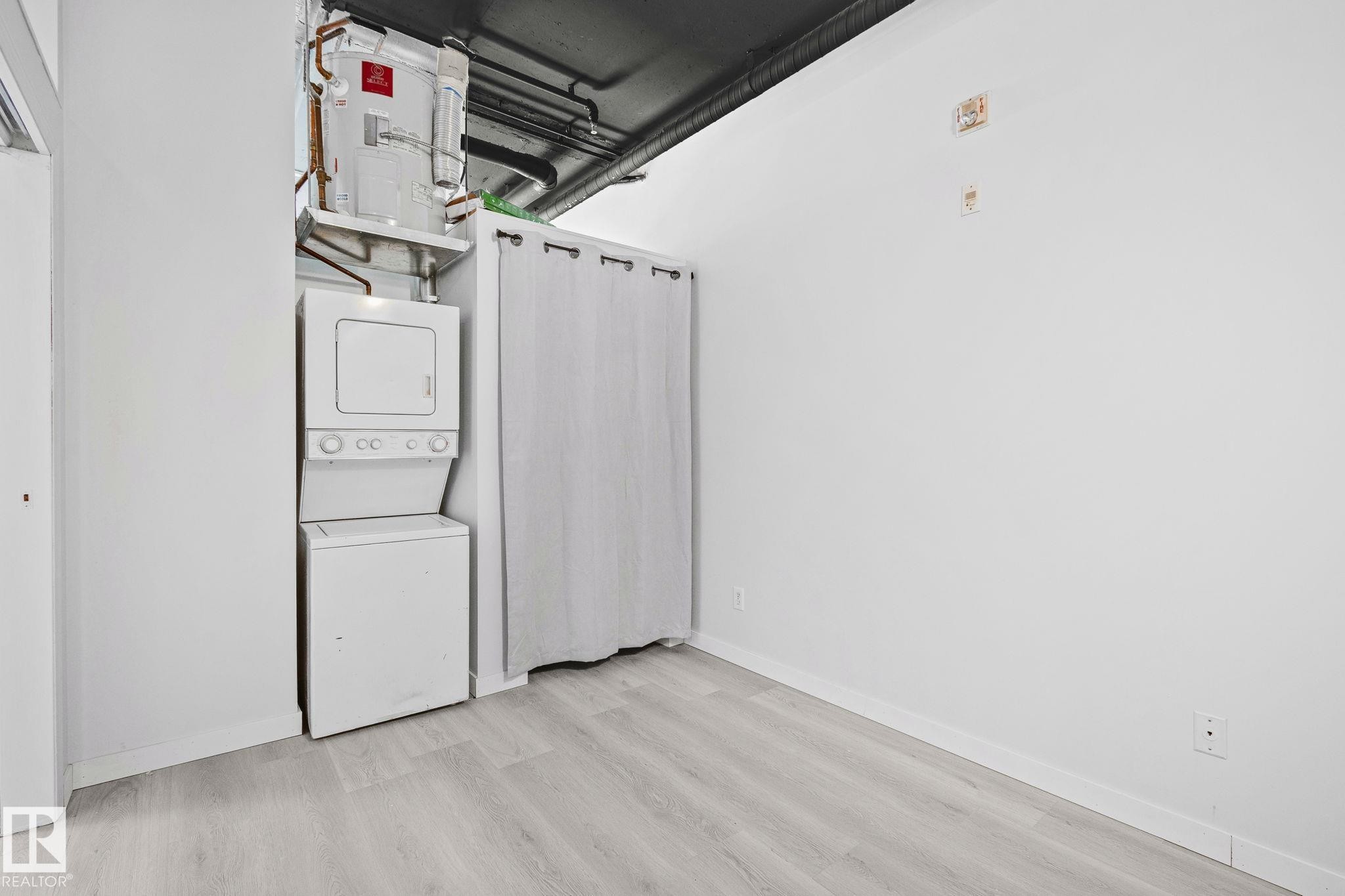 1312 10024 Jasper Avenue Nw, Edmonton, AB - Indoor Photo Showing Laundry Room