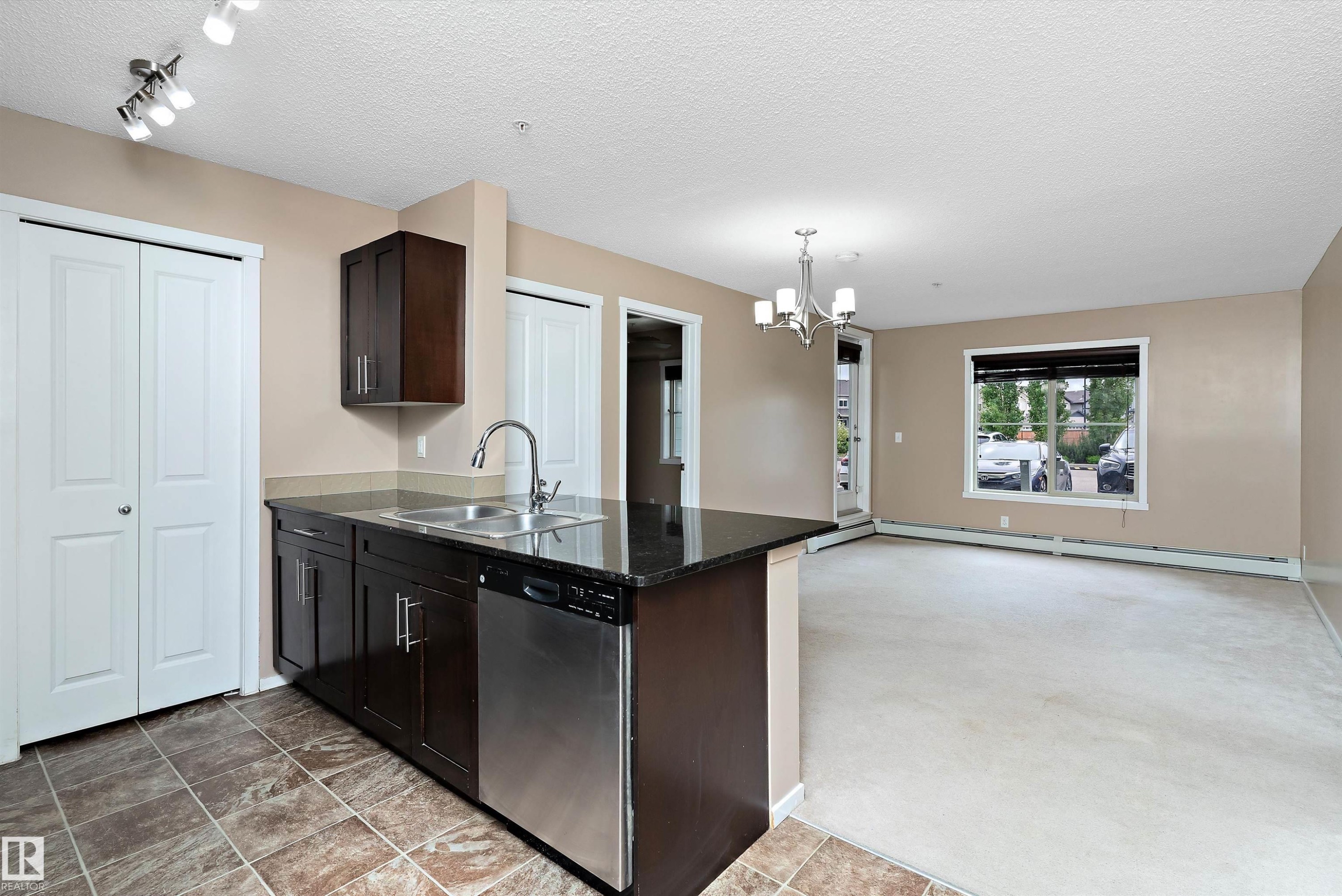 105 111 Watt Common, Edmonton, AB - Indoor Photo Showing Kitchen With Double Sink