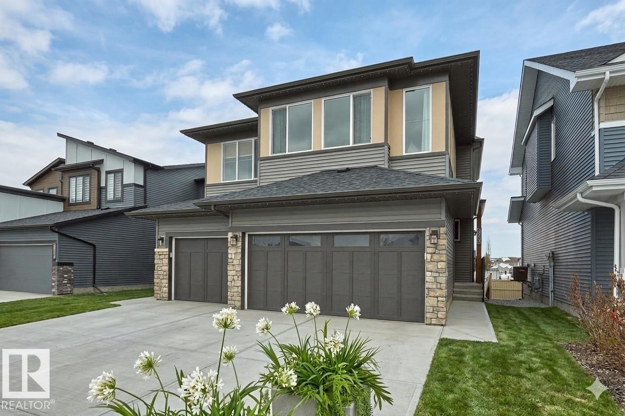 landscaping AI enhanced. Front landscaping is included in price - 5641 Hawthorn Way, Edmonton, AB - Outdoor