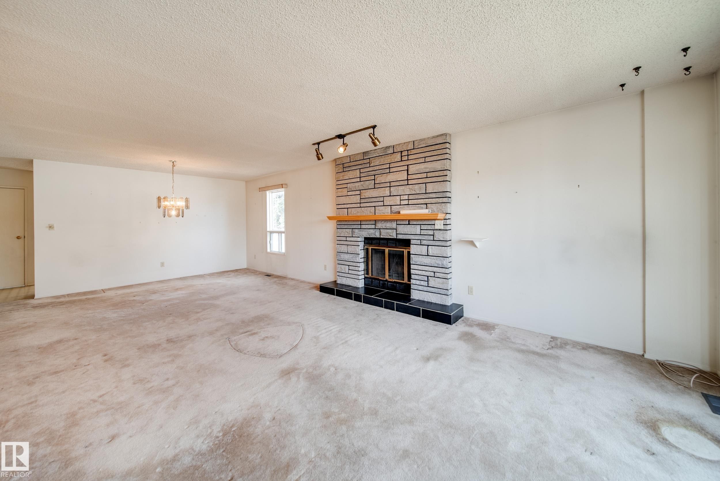 1030 106 Street, Edmonton, AB - Indoor Photo Showing Living Room With Fireplace