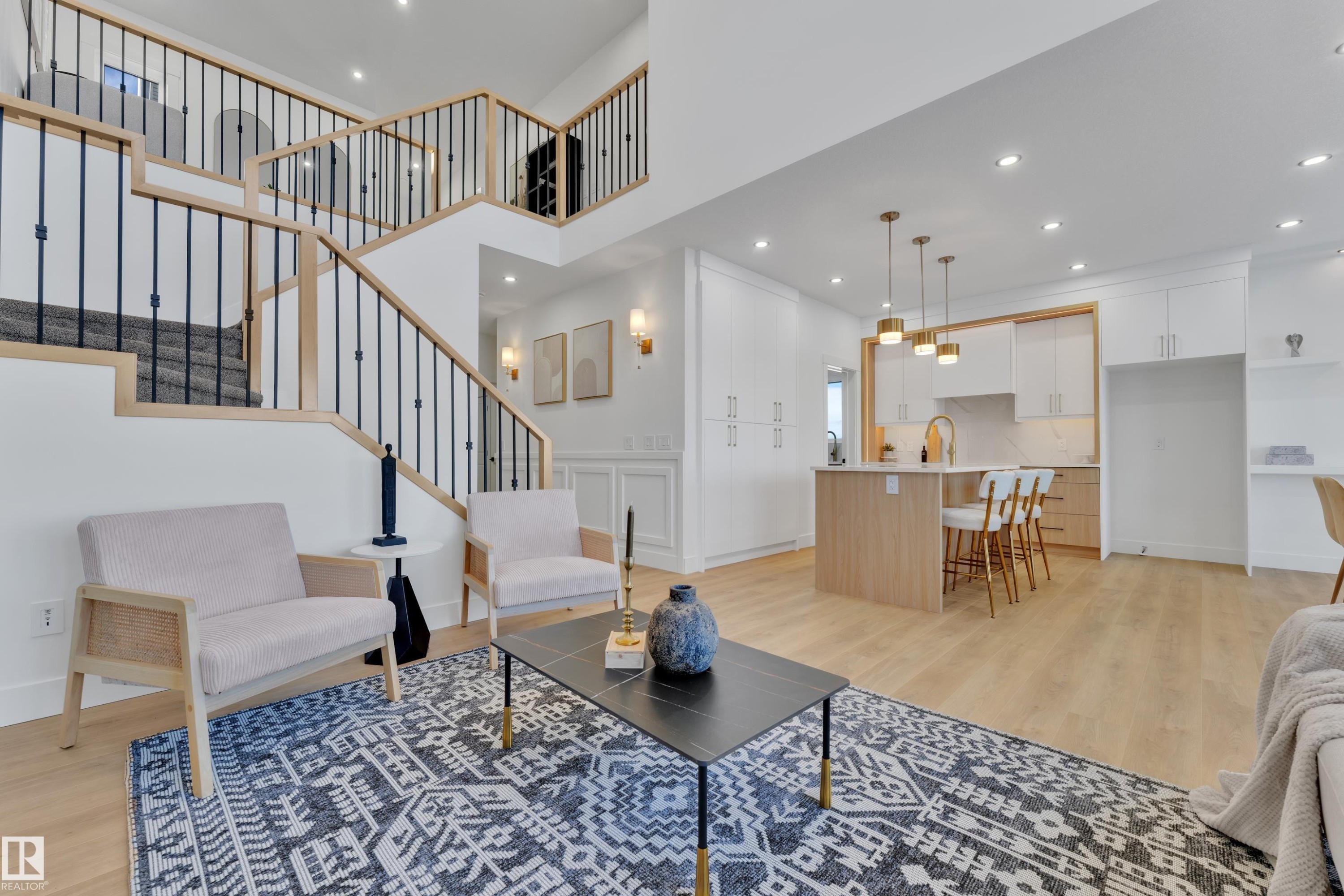 Open-concept living area featuring light wood-finish flooring throughout - 382 Linden Loop, Leduc, AB - Indoor Photo Showing Living Room