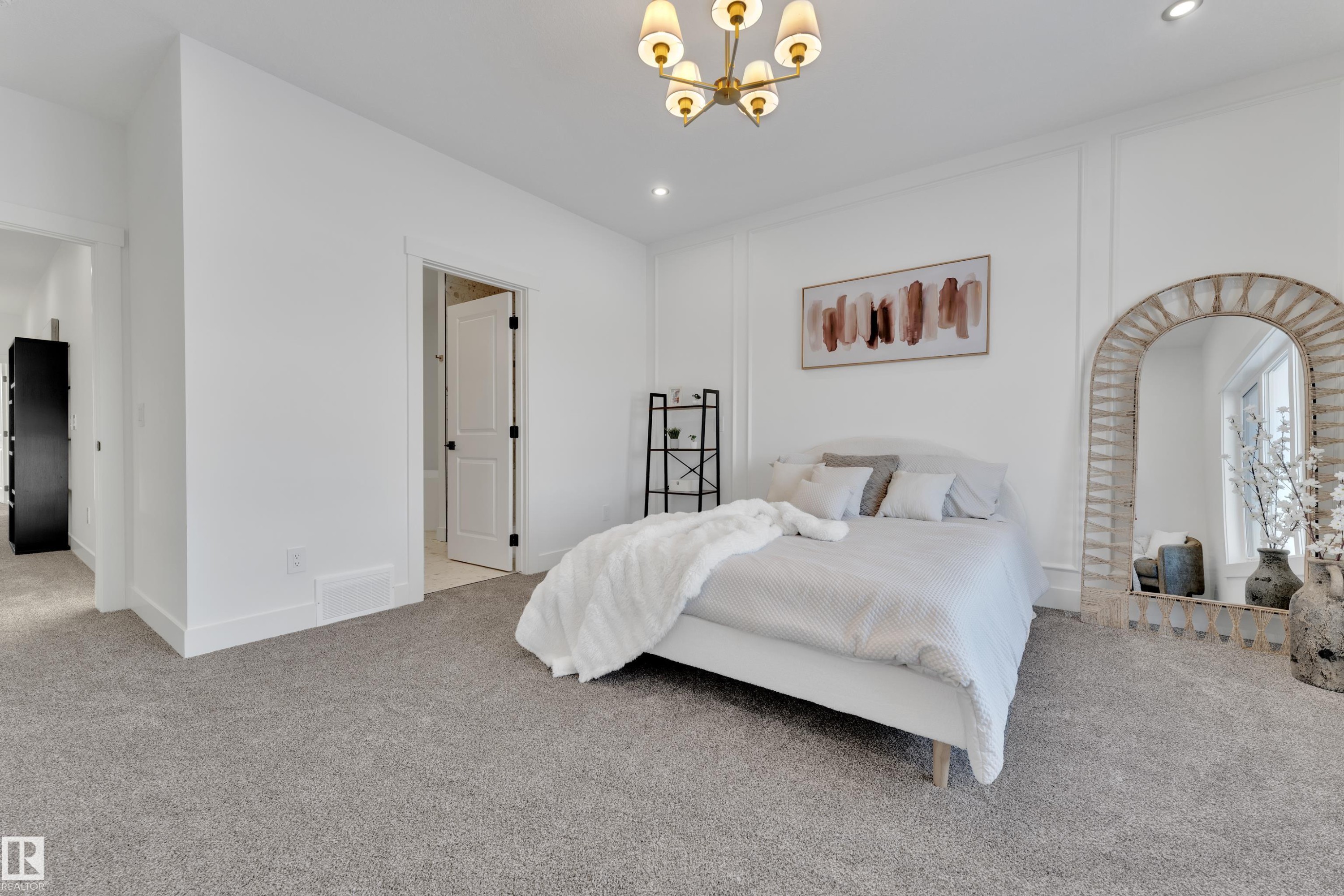 Bright room featuring white walls, panel molding, recessed lighting, and a gold-tone chandelier - 382 Linden Loop, Leduc, AB - Indoor Photo Showing Bedroom