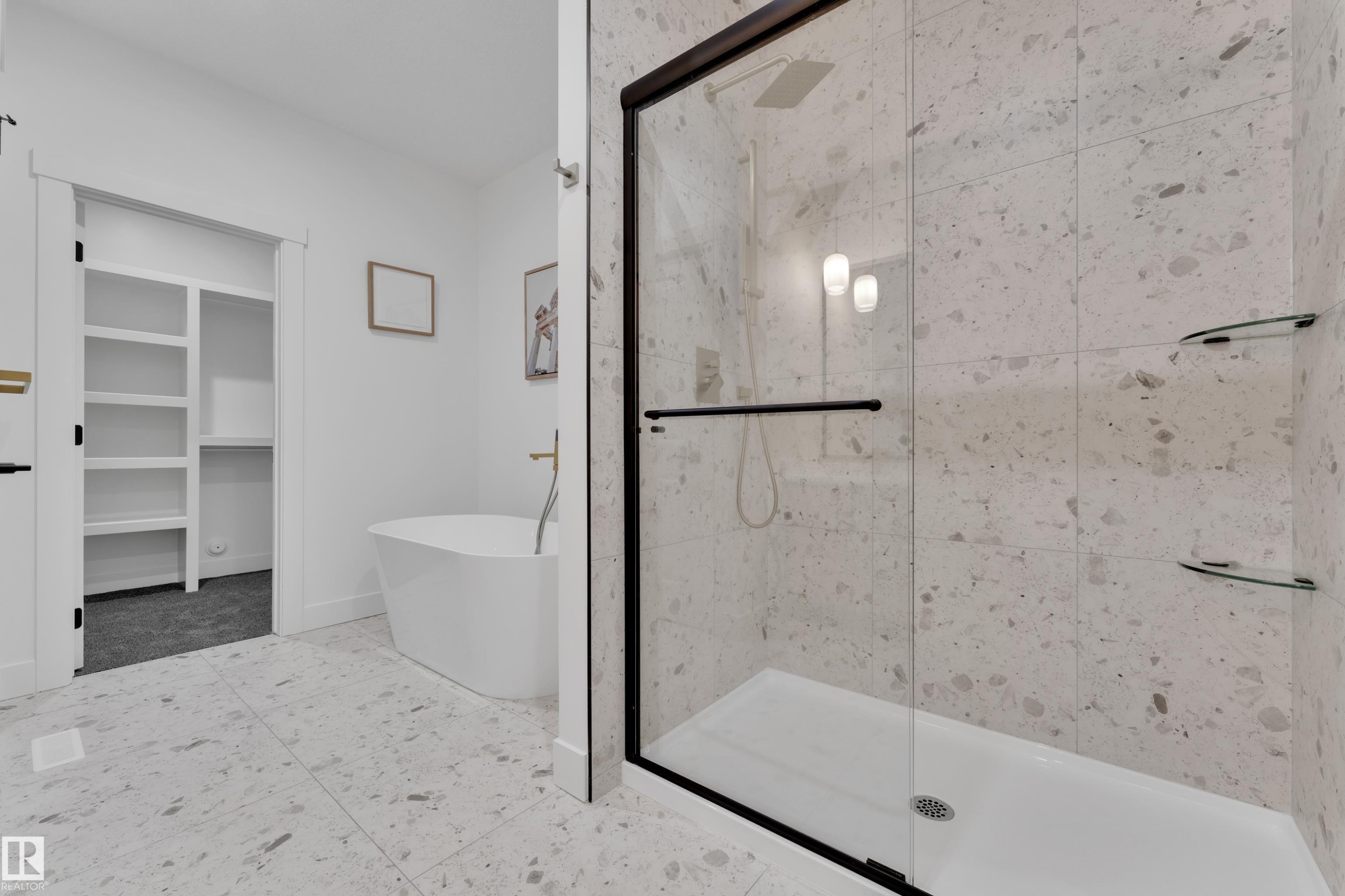Glass-enclosed shower with a matte black frame, rain shower head, and recessed lighting - 382 Linden Loop, Leduc, AB - Indoor Photo Showing Bathroom