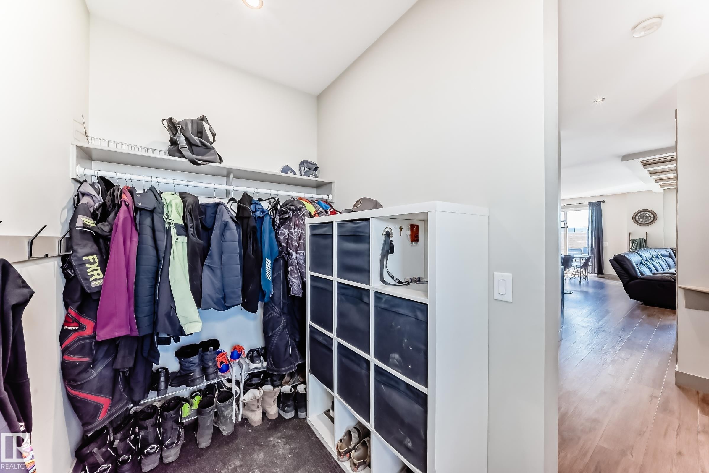 Dedicated mudroom featuring built-in shelving, coat hooks, and recessed lighting - 5263 47 Ave, Calmar, AB - Indoor Photo Showing Other Room